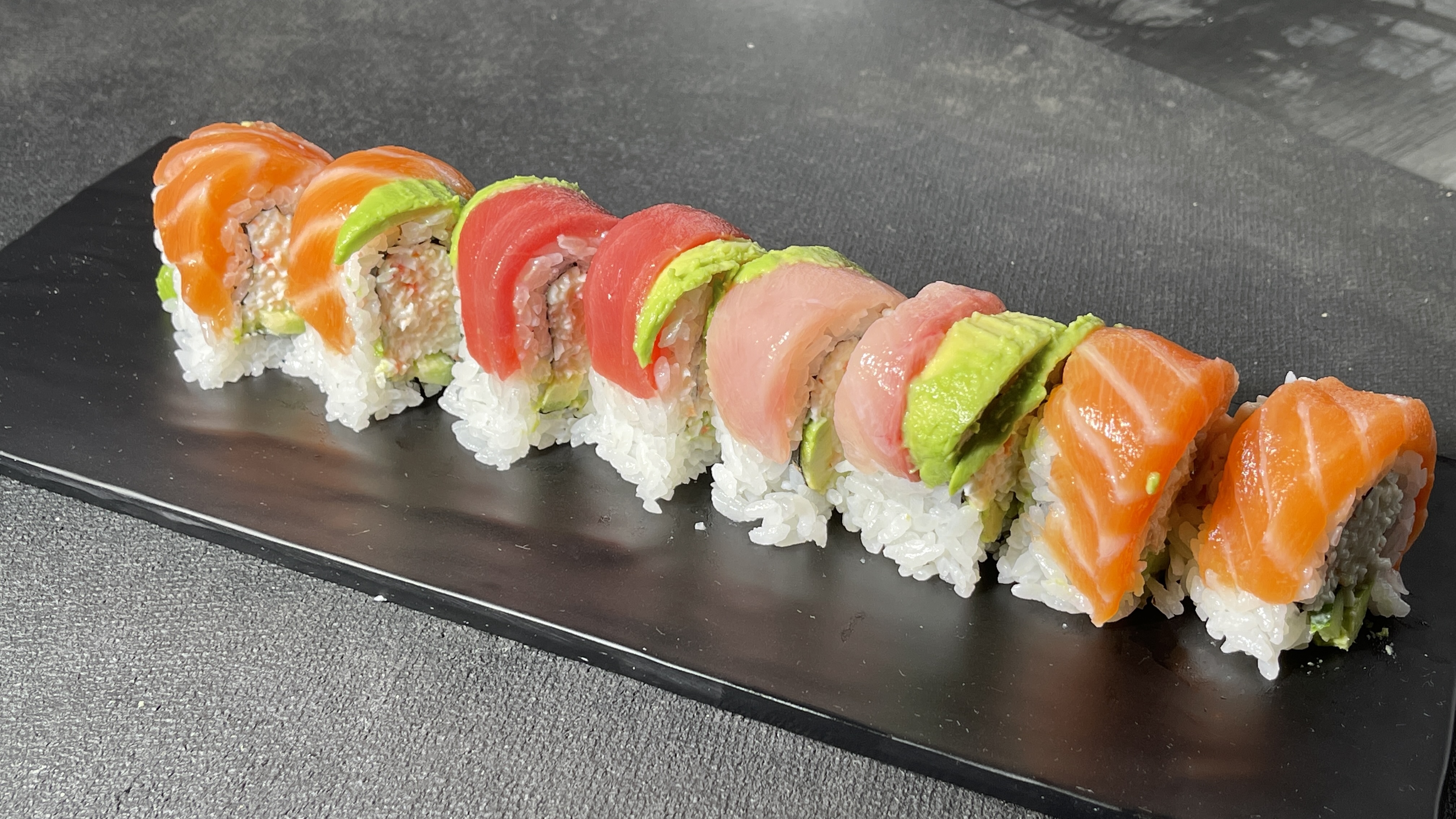 Order 46. Rainbow Cut Roll food online from Miyoda Sushi store, Redondo Beach on bringmethat.com