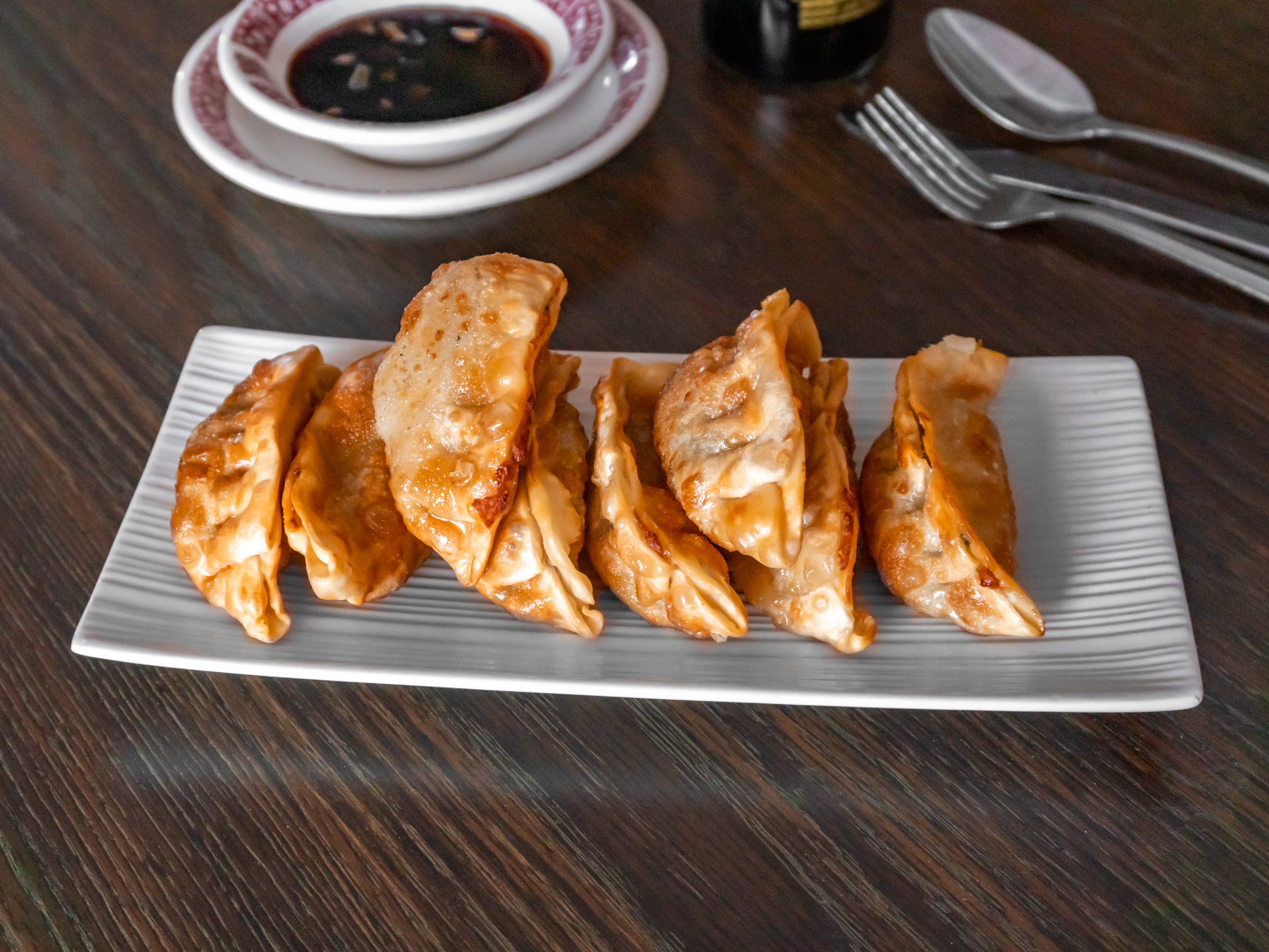 Order 10. Pot Stickers food online from Golden Mountain Restaurant store, Wickliffe on bringmethat.com