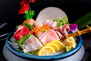 Order 18 Sashimi Deluxe food online from Kinha Sushi store, Garden City on bringmethat.com
