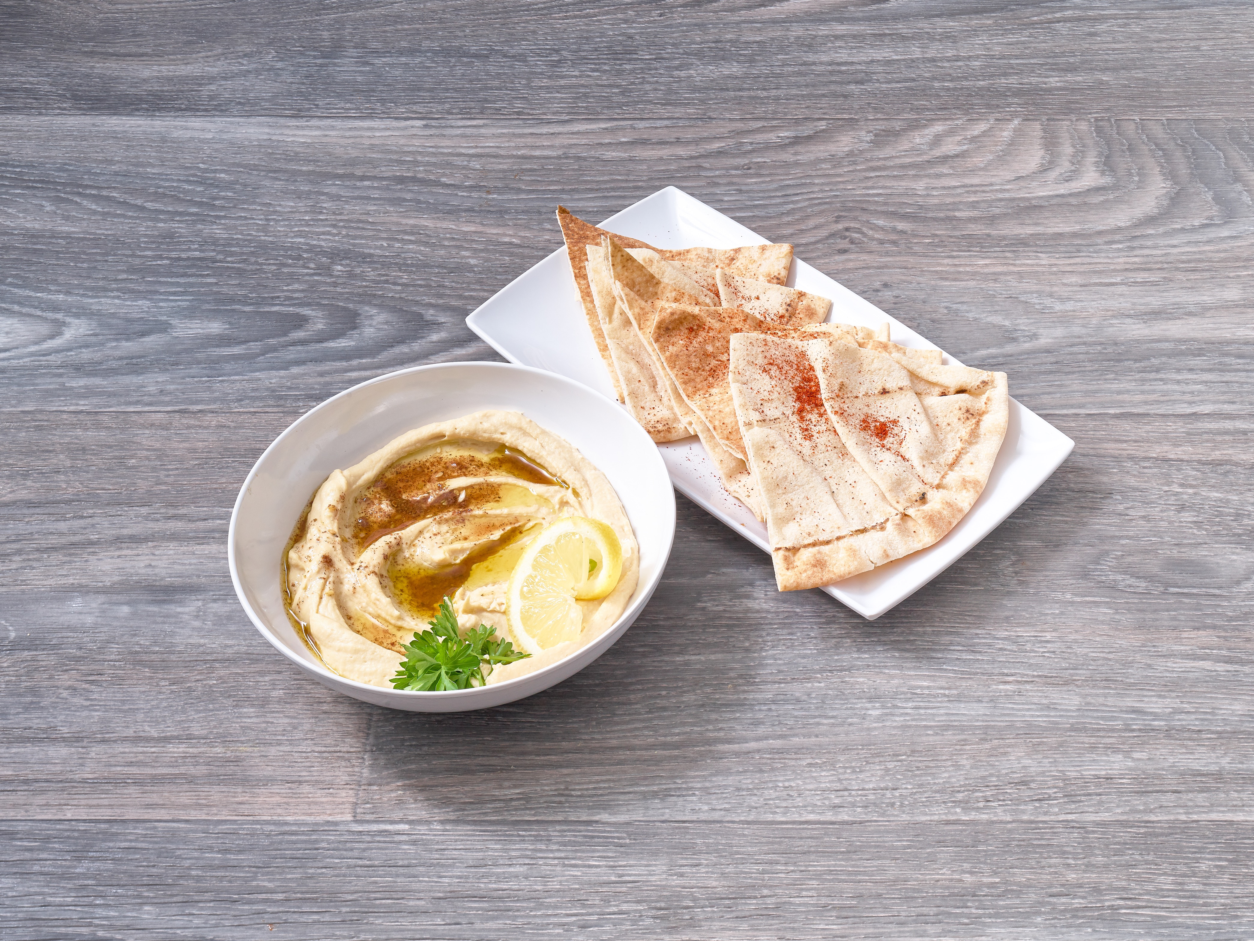 Order Hummus food online from Mona's Lebanese Cafe store, Sterling on bringmethat.com