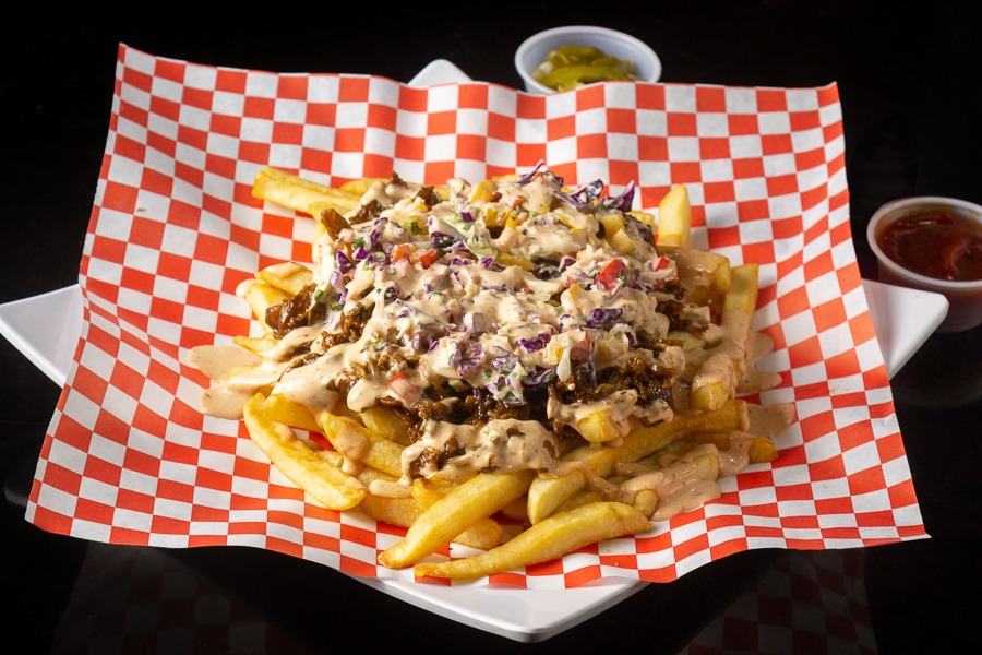 Order pulled pork fries food online from California Fries And Wings store, San Diego on bringmethat.com