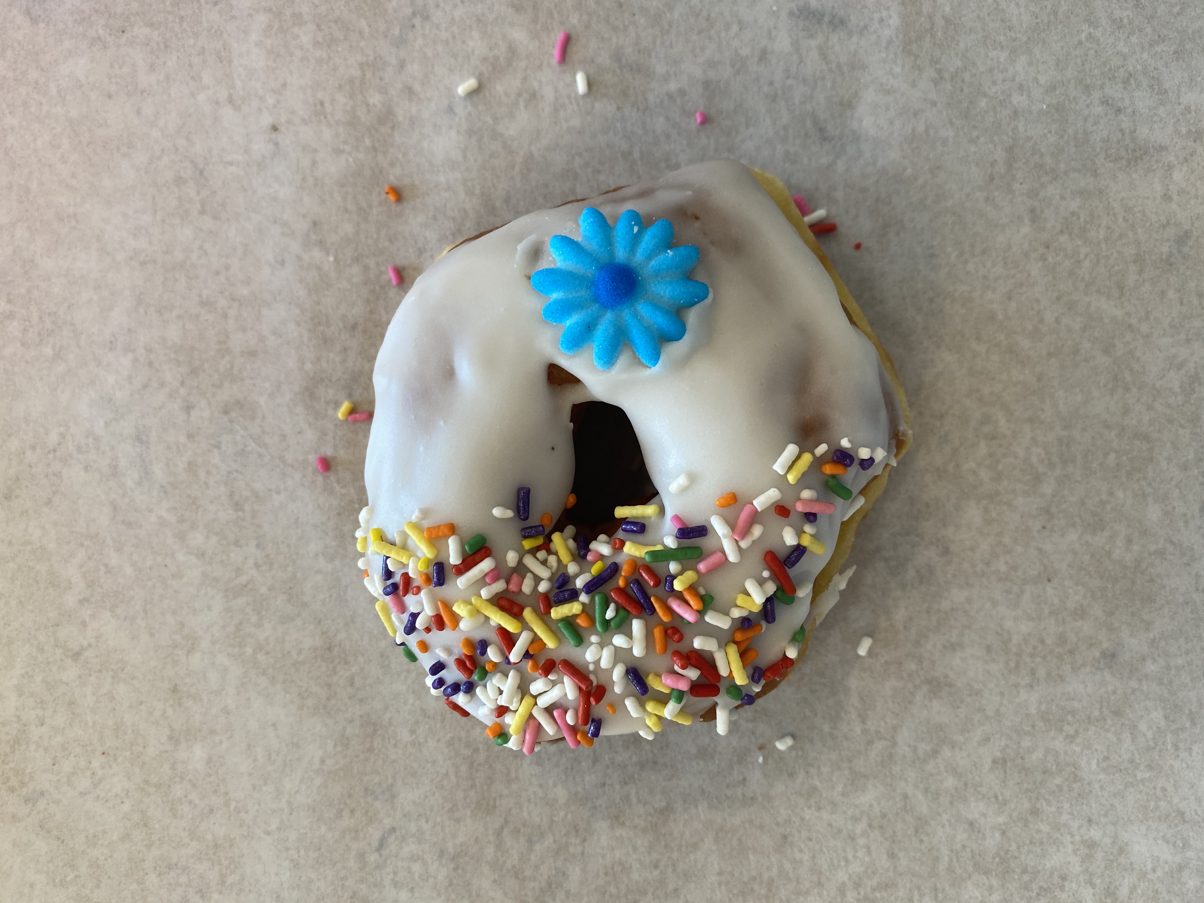 Order Vanilla Frosted Donut food online from Sesame Donuts store, Portland on bringmethat.com