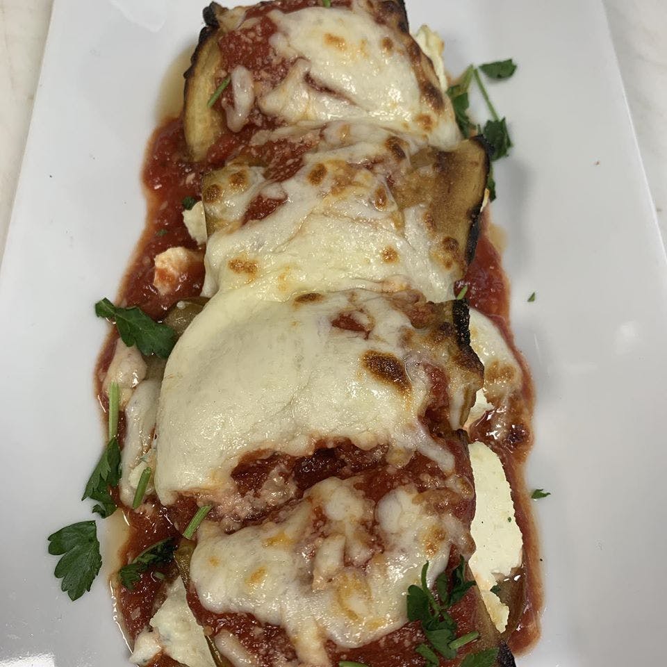Order Eggplant Rollatini Appetizer - Appetizer food online from Se7te Woodfire Pizza store, Totowa on bringmethat.com