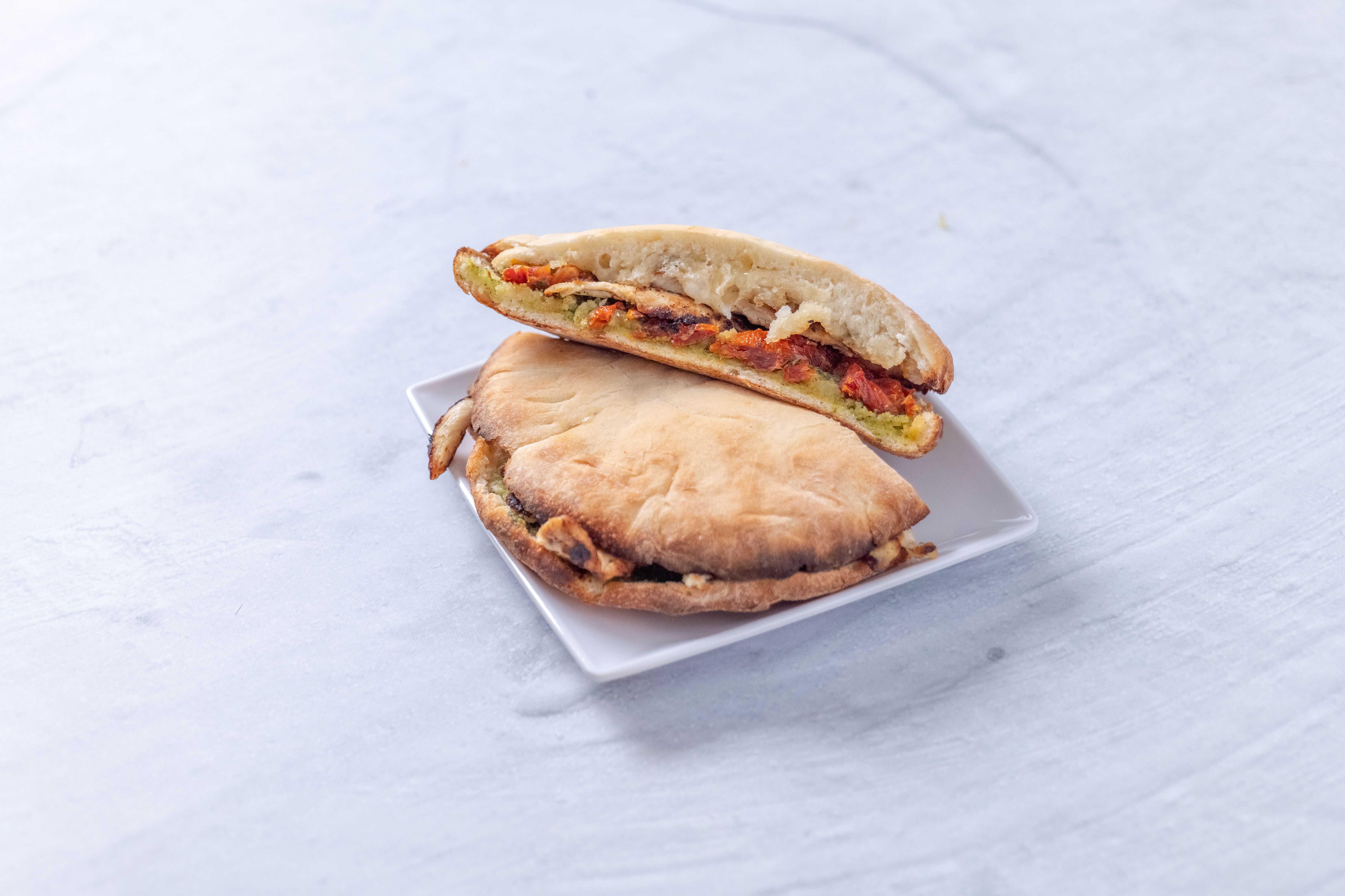 Order Panino Pollo food online from Tutt A Post Trattoria store, Beverly Hills on bringmethat.com