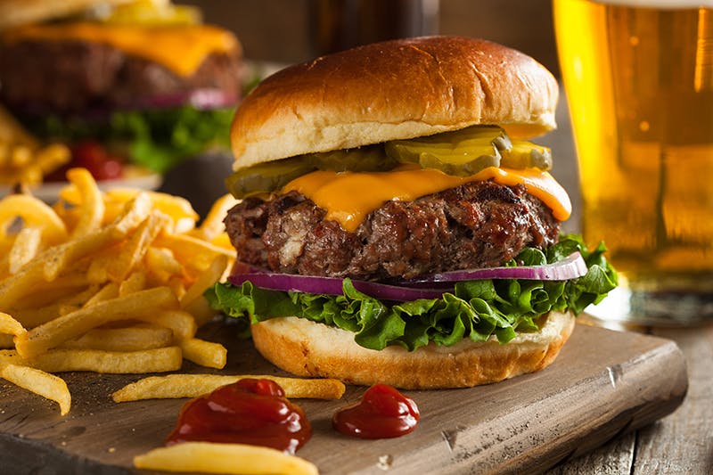 Order Cheeseburger - Burger food online from Pizza Town store, Conway on bringmethat.com