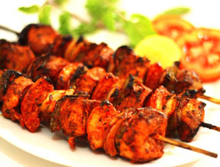 Order Tandoori Chicken Tikka food online from India Garden Restaurant store, Blacksburg on bringmethat.com