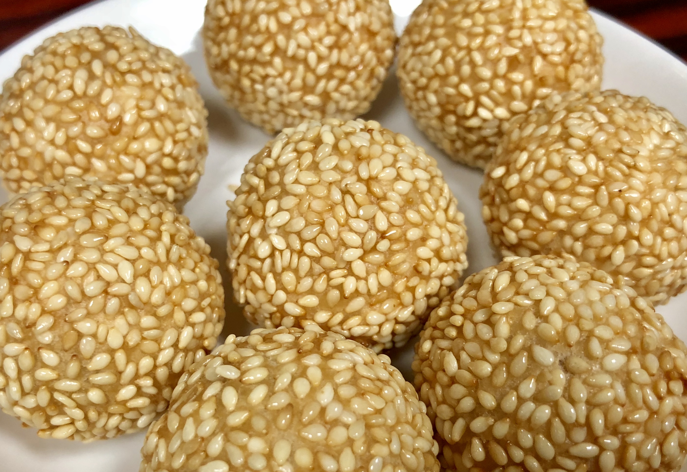 Order A7. Sesame Ball (8)芝麻球 food online from East Wall Chinese Cuisine store, Plano on bringmethat.com