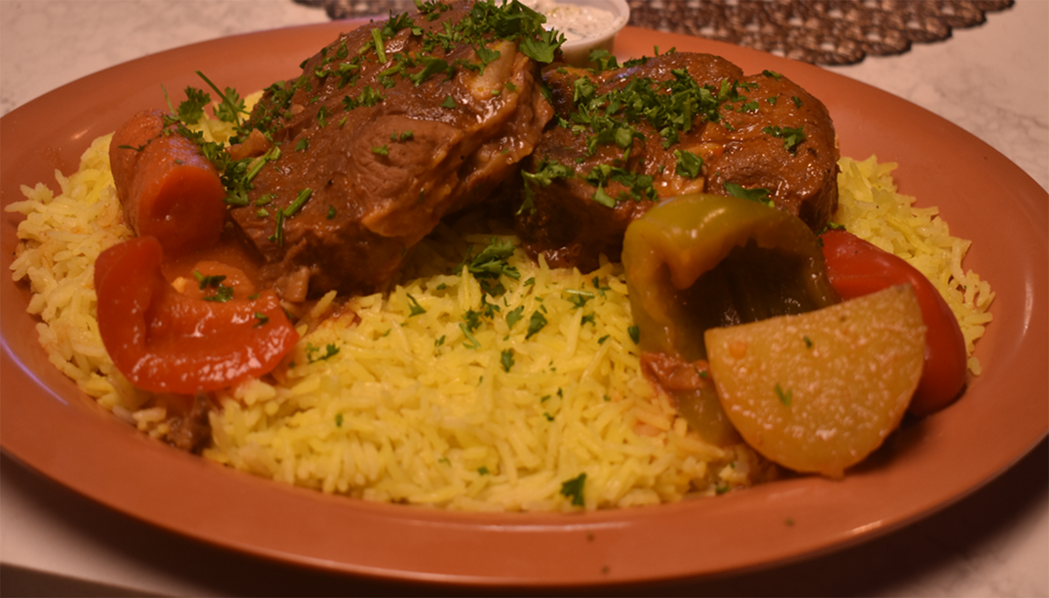 Order Lamb Kabsa Special food online from Ali Baba Grill store, Boulder on bringmethat.com