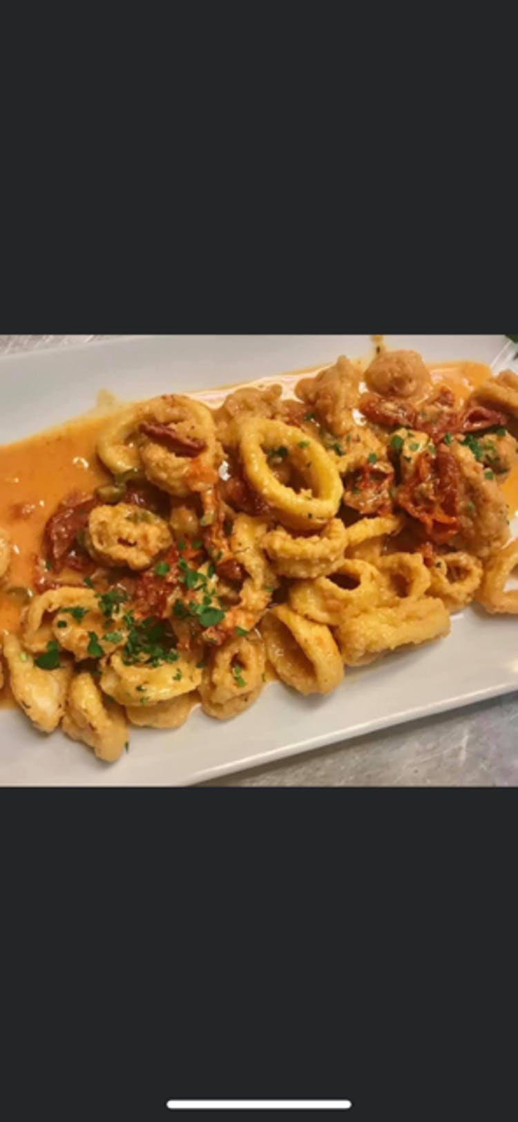 Order Fried Calamari - Side food online from Napoli Pizza store, Meriden on bringmethat.com