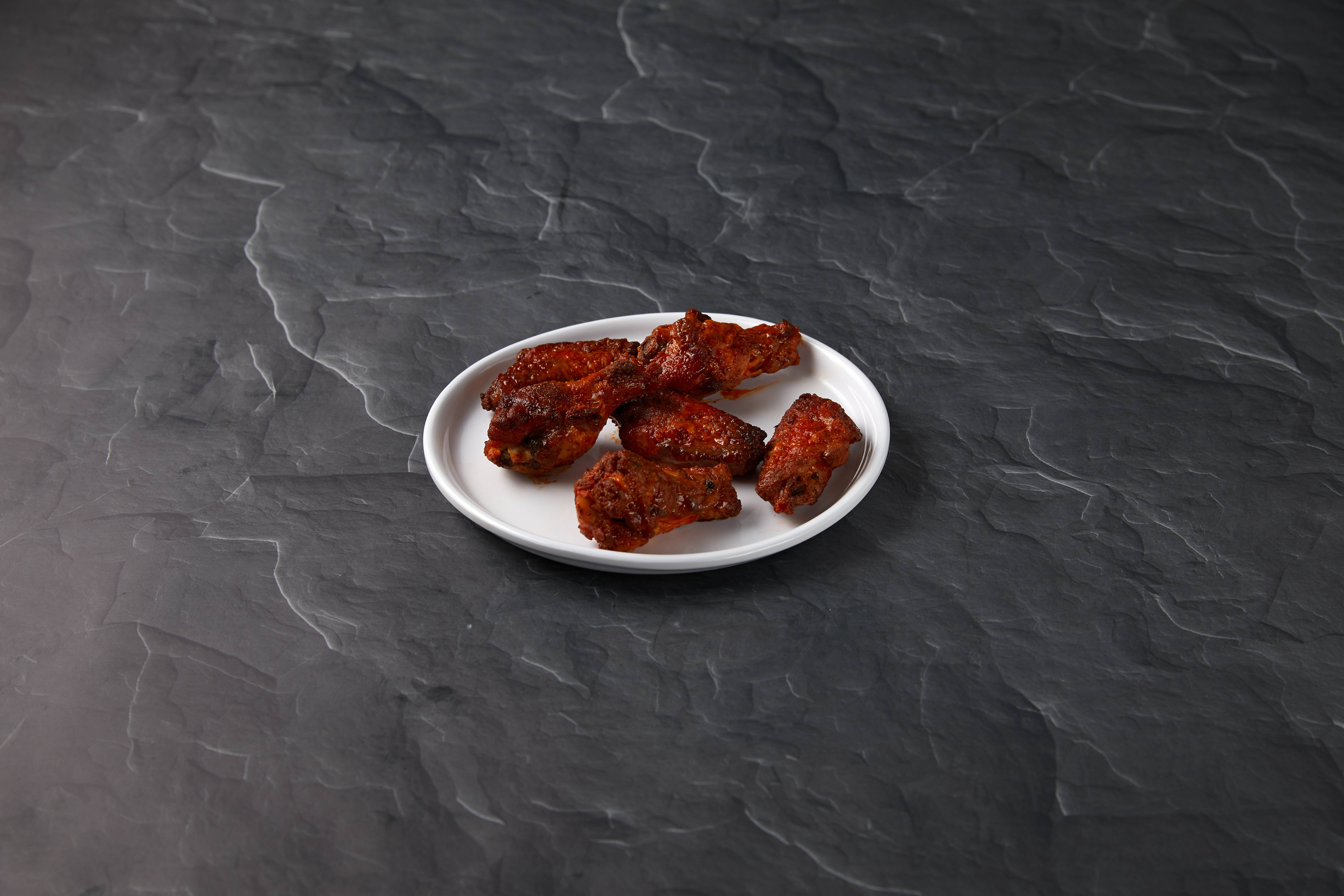 Order Classic Wings food online from Round Table Pizza store, Las Vegas on bringmethat.com