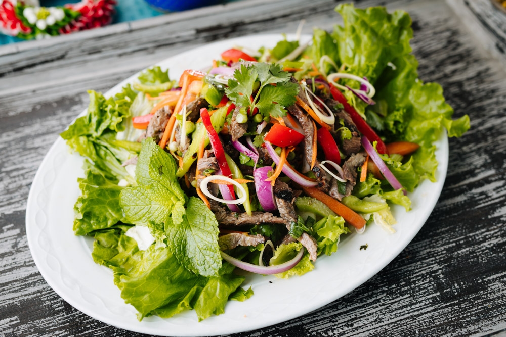 Order Beef Salad food online from Banana Leaf Thai Restaurant store, Dallas on bringmethat.com