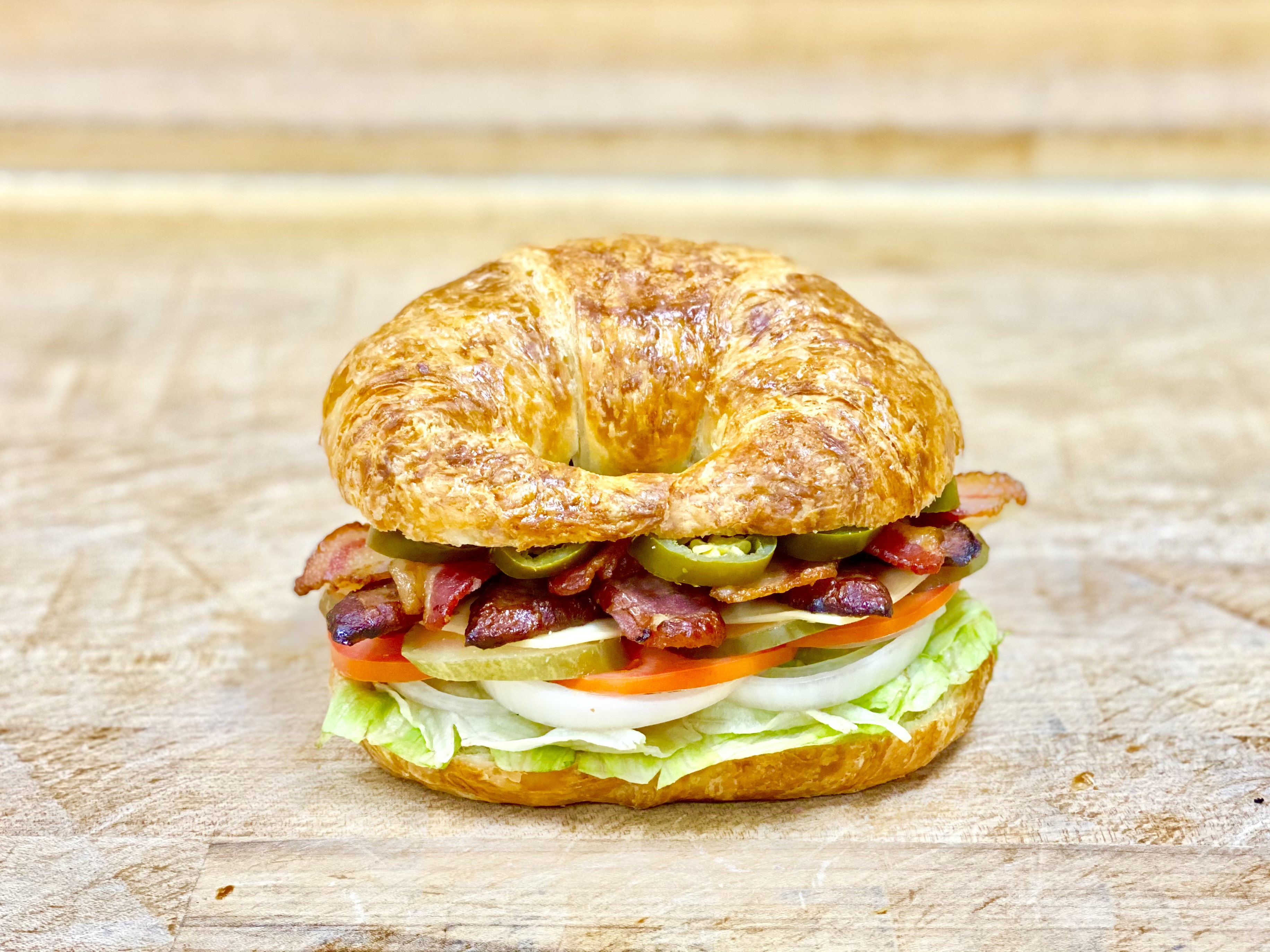 Order L-12 Bacon & Sausage & Cheese Croissant food online from K-Inn Donuts store, Paramount on bringmethat.com