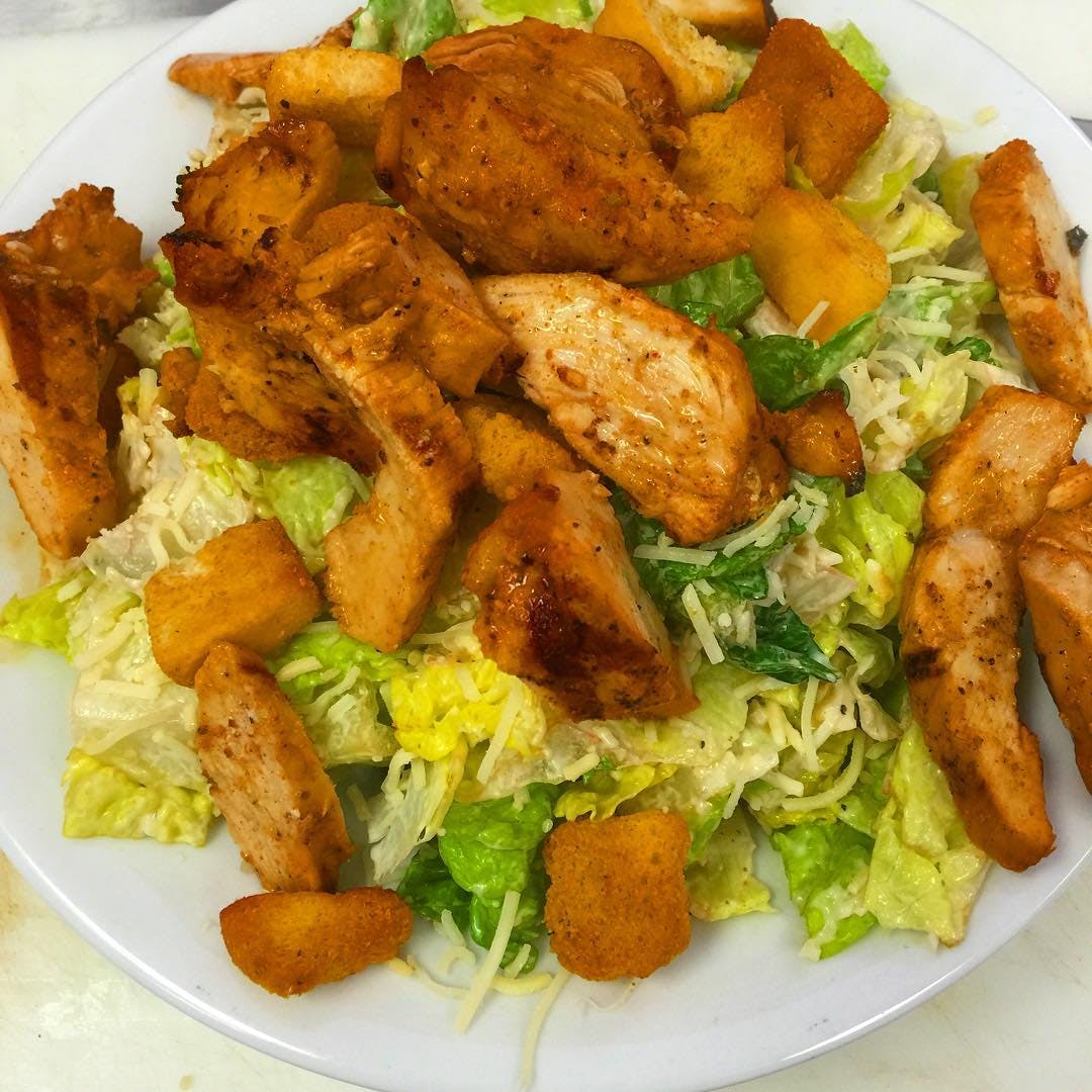 Order Chicken Caesar Salad Catering - Half Tray (Serves 6-8) food online from Verdugo Pizza store, Glendale on bringmethat.com