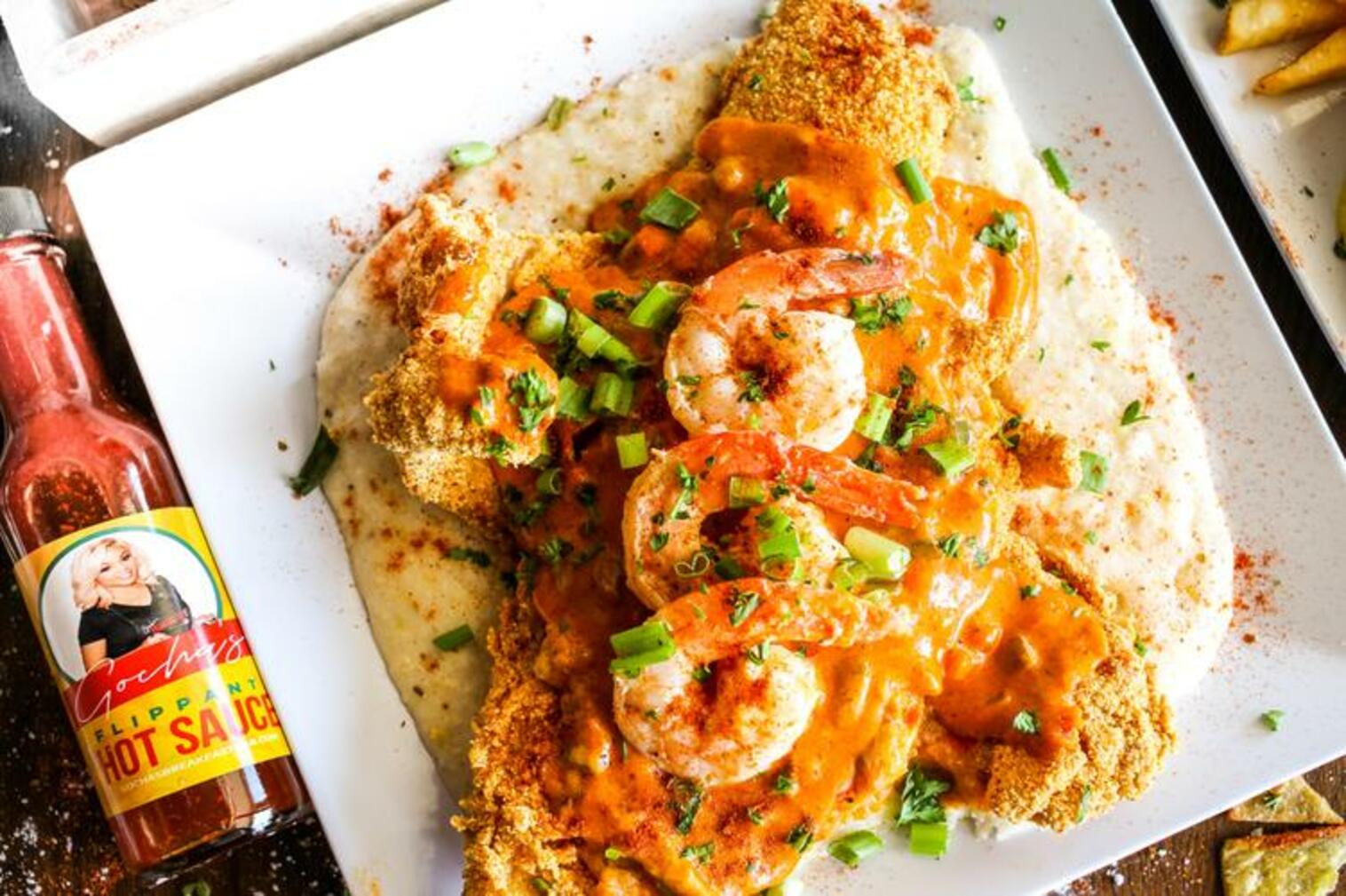 Order Cajun Creole Gulf Shrimp Fish and Grits food online from Gocha Breakfast Bar store, Fayetteville on bringmethat.com