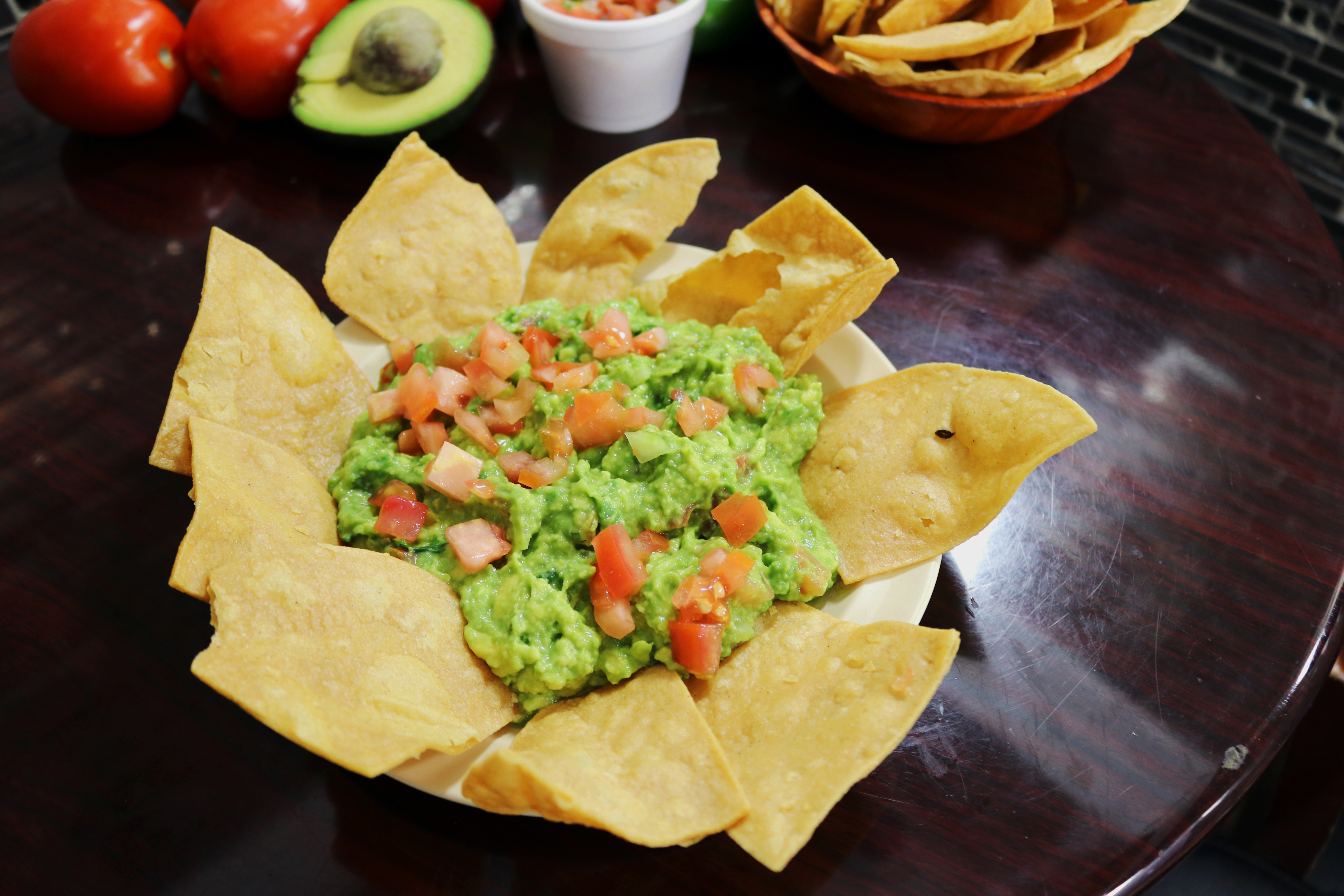 Order Guacamole food online from Tequilas Taqueria store, San Jose on bringmethat.com