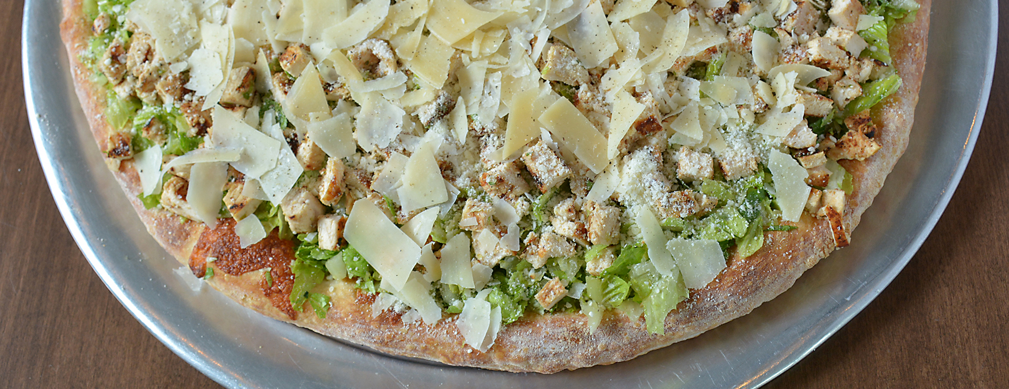 Order Caesar Salad Pizza with Grilled Chicken food online from Mario's Pizzeria store, Oyster Bay on bringmethat.com