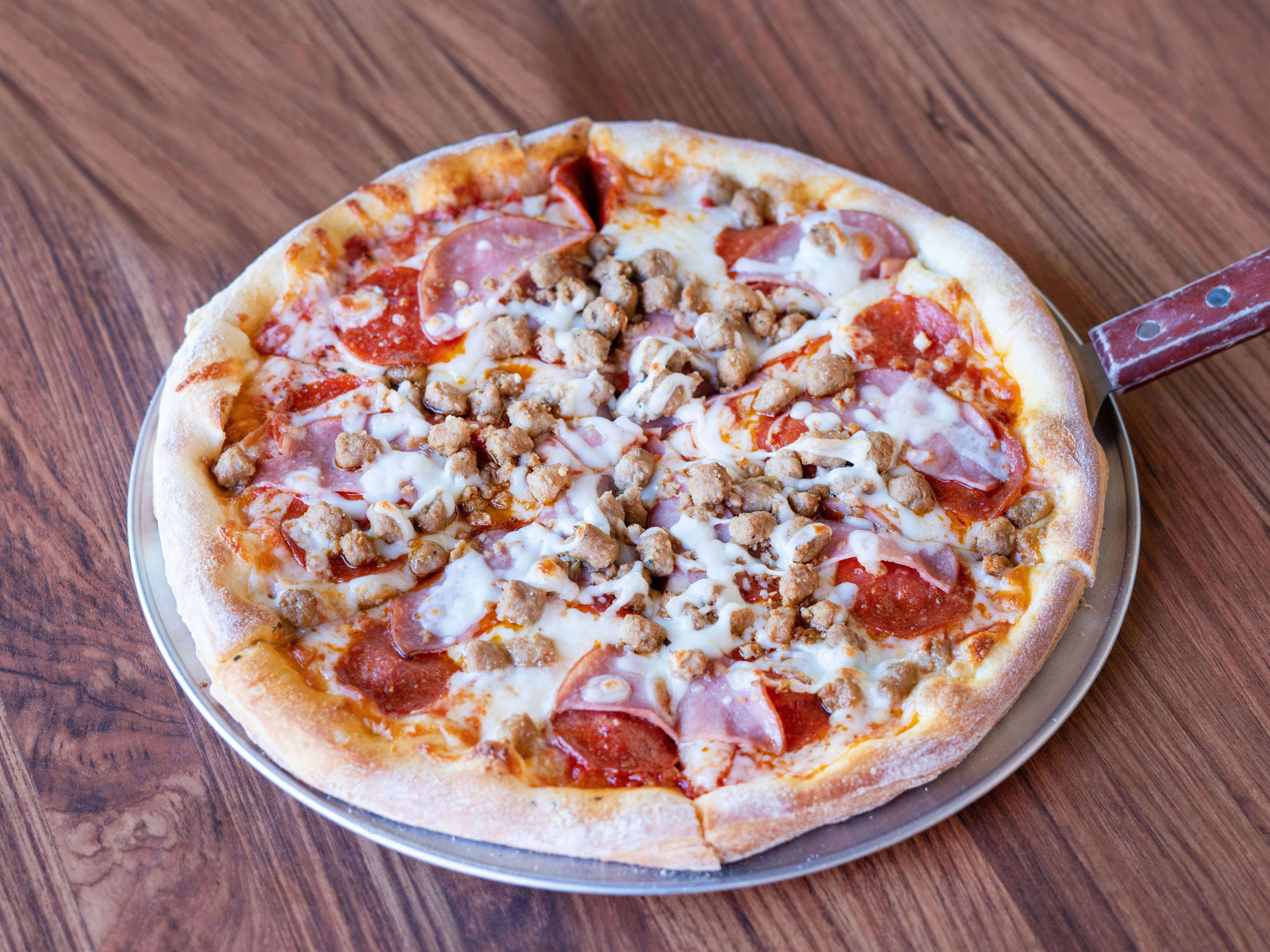 Order Meatlovers Pizza food online from Vito Pizza & Grill store, Irving on bringmethat.com