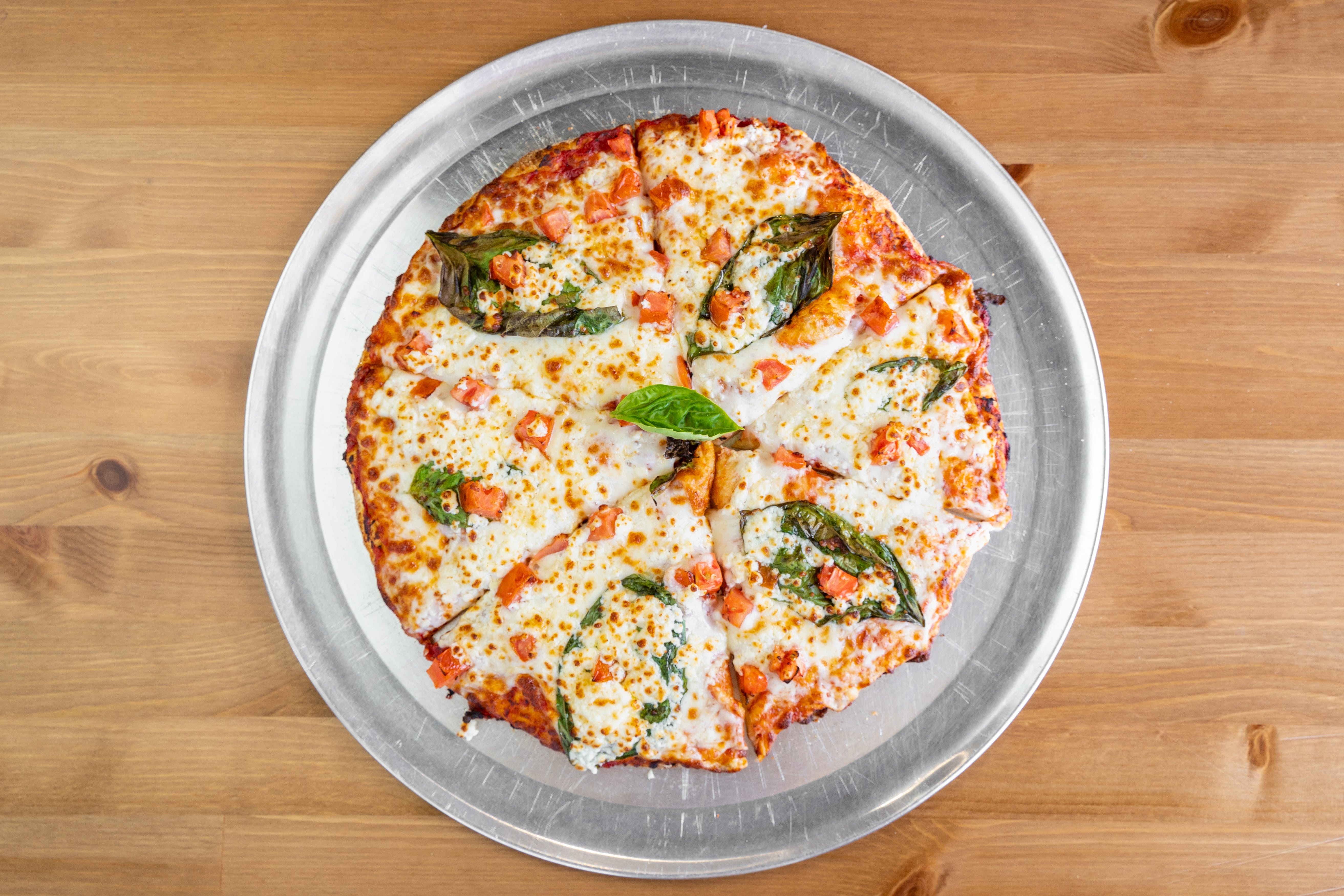 Order Margherita Pizza - Small 12" (6 Slices) food online from Golden Edge Pizza store, San Francisco on bringmethat.com