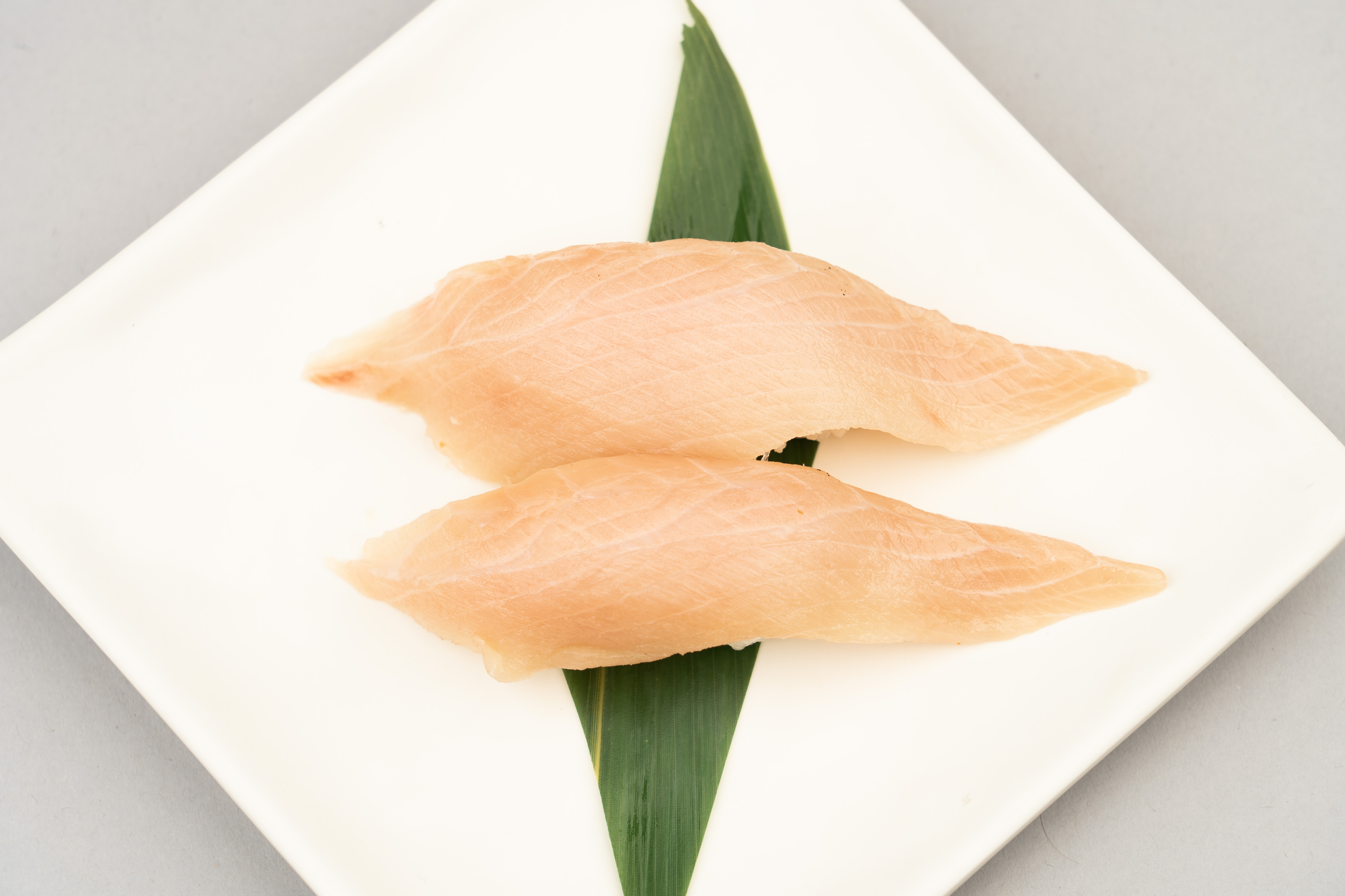 Order 2 Piece Yellowtail Sushi food online from Kaiba Japanese Restaurant store, Monterey Park on bringmethat.com