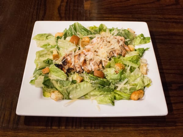 Order  Chicken Caesar Salad food online from Ashley's Restaurant store, Ann Arbor on bringmethat.com