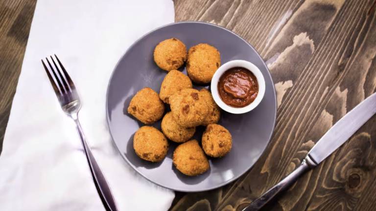 Order Hushpuppies (10 pcs) food online from Red Hook Cajun Seafood & Bar store, Southaven on bringmethat.com