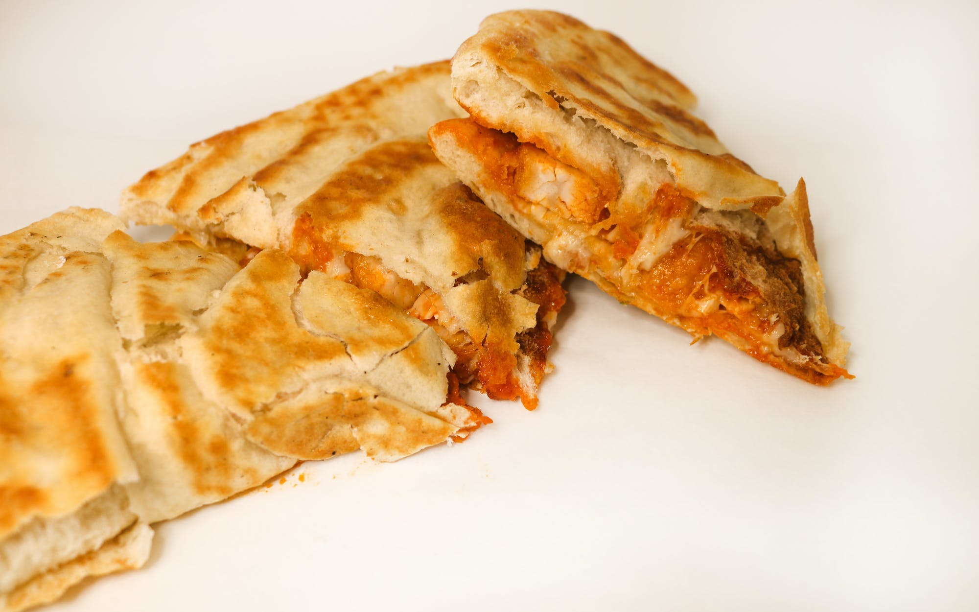 Order Buff Chix Pizzadilla - Regular food online from Muncheez By Villa Pizza store, North Olmsted on bringmethat.com