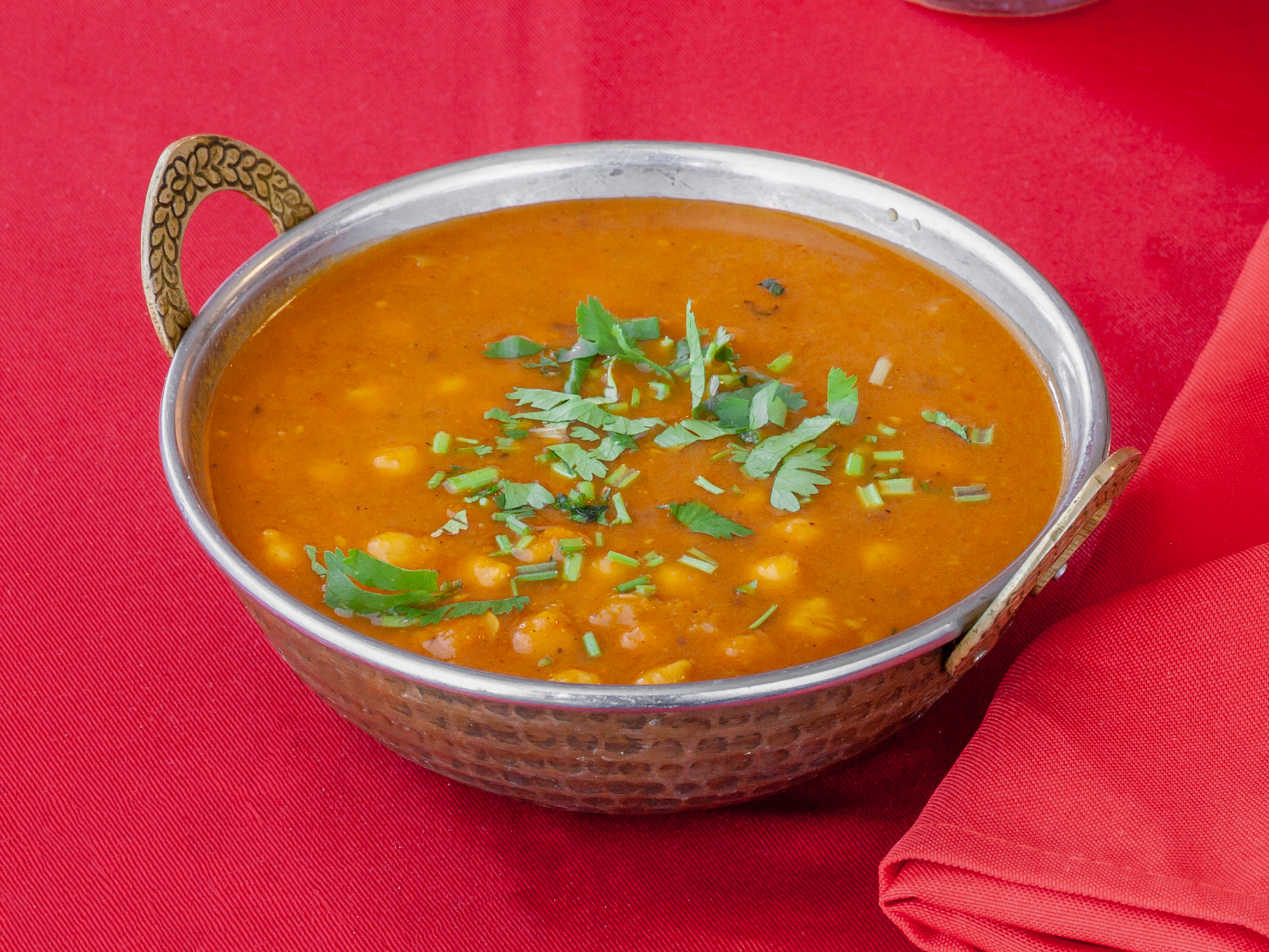 Order 50. Channa Masala food online from Ambar Indian Restaurant store, Champaign on bringmethat.com