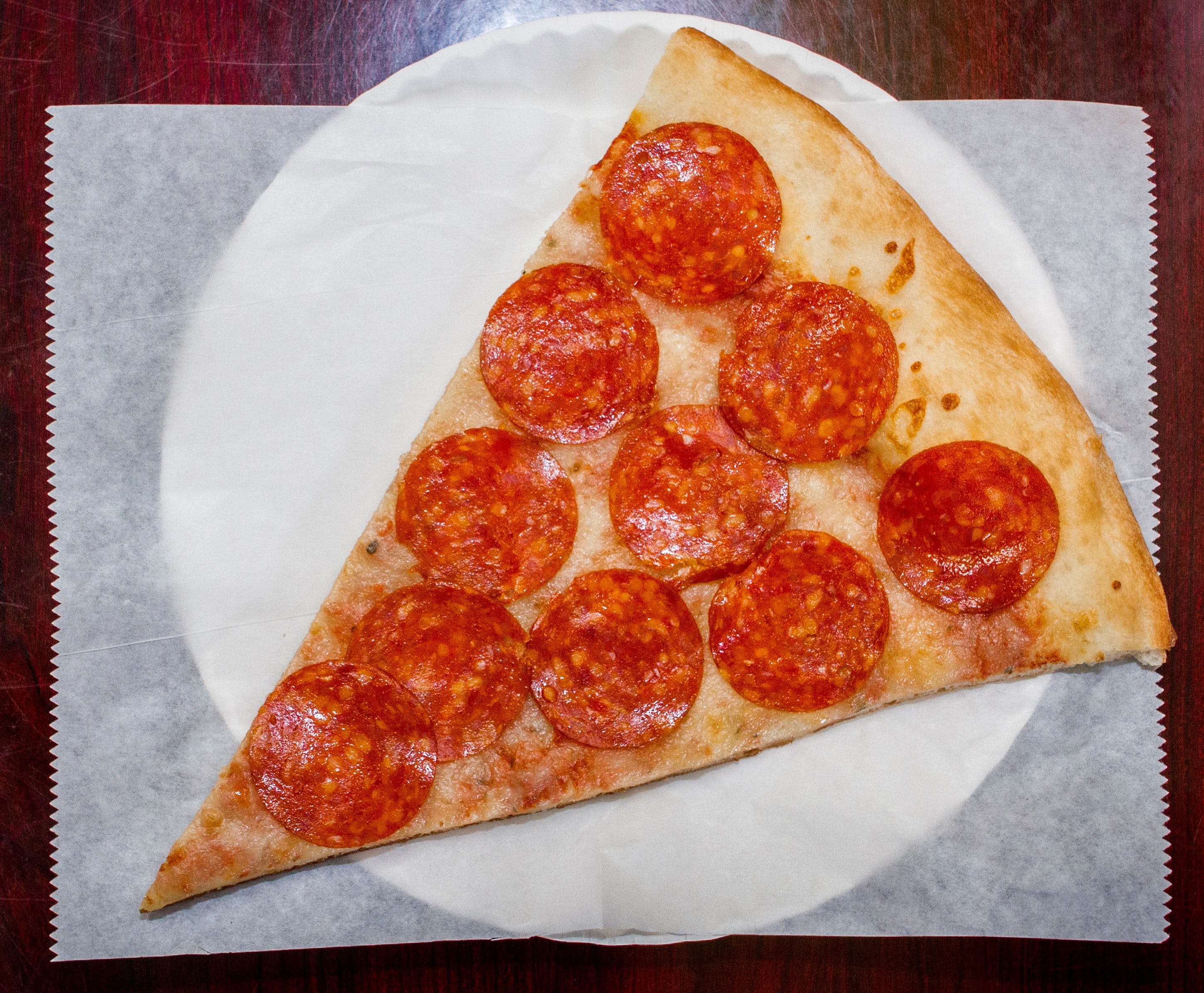 Order Pepperoni Pizza Slice - Slice food online from Oasis restaurant store, Sunnyside on bringmethat.com