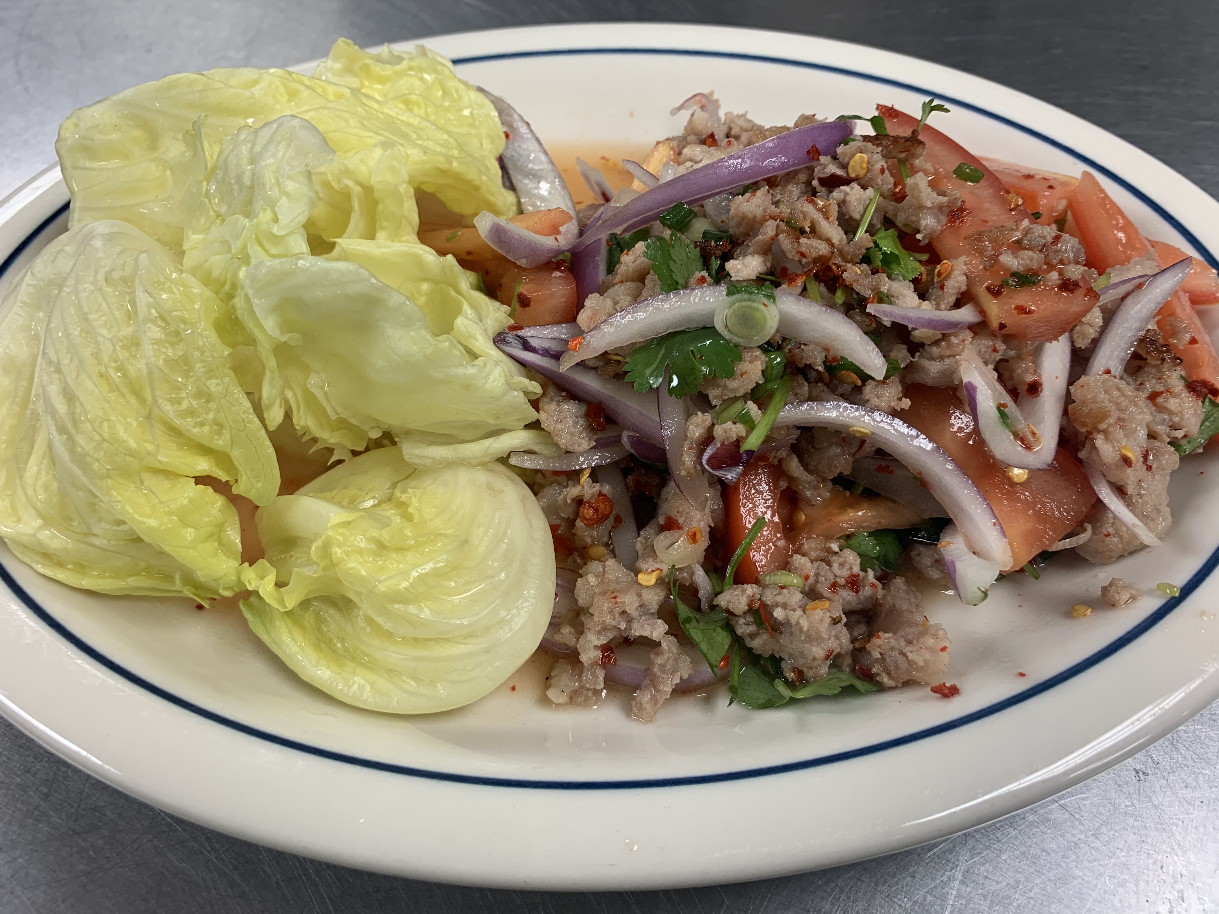 Order V-2. Pork Salad food online from 5 R CHA Thai Bistro store, Mesa on bringmethat.com