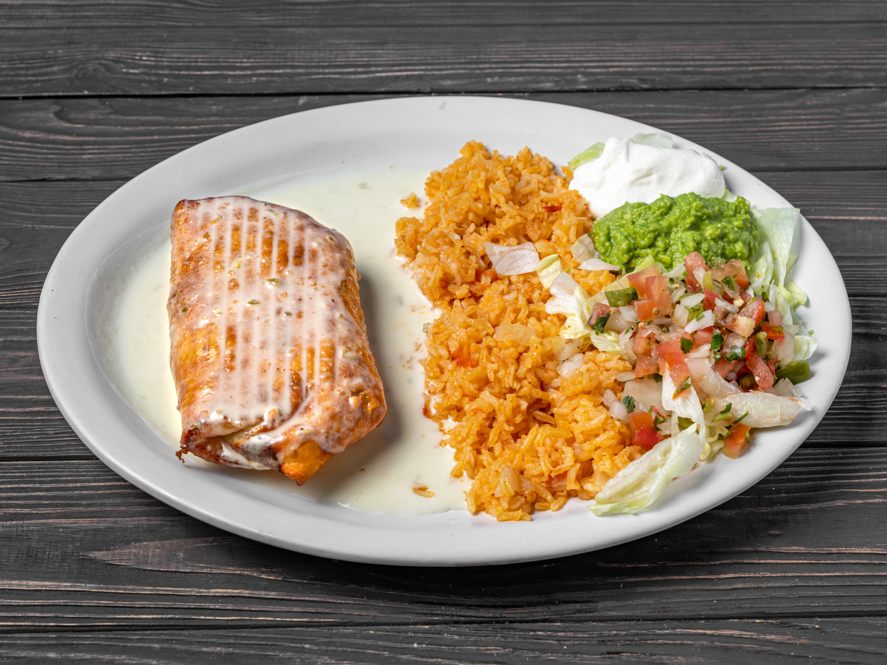 Order Chimichanga Lunch food online from Portales Mexican Restaurant store, Cordova on bringmethat.com