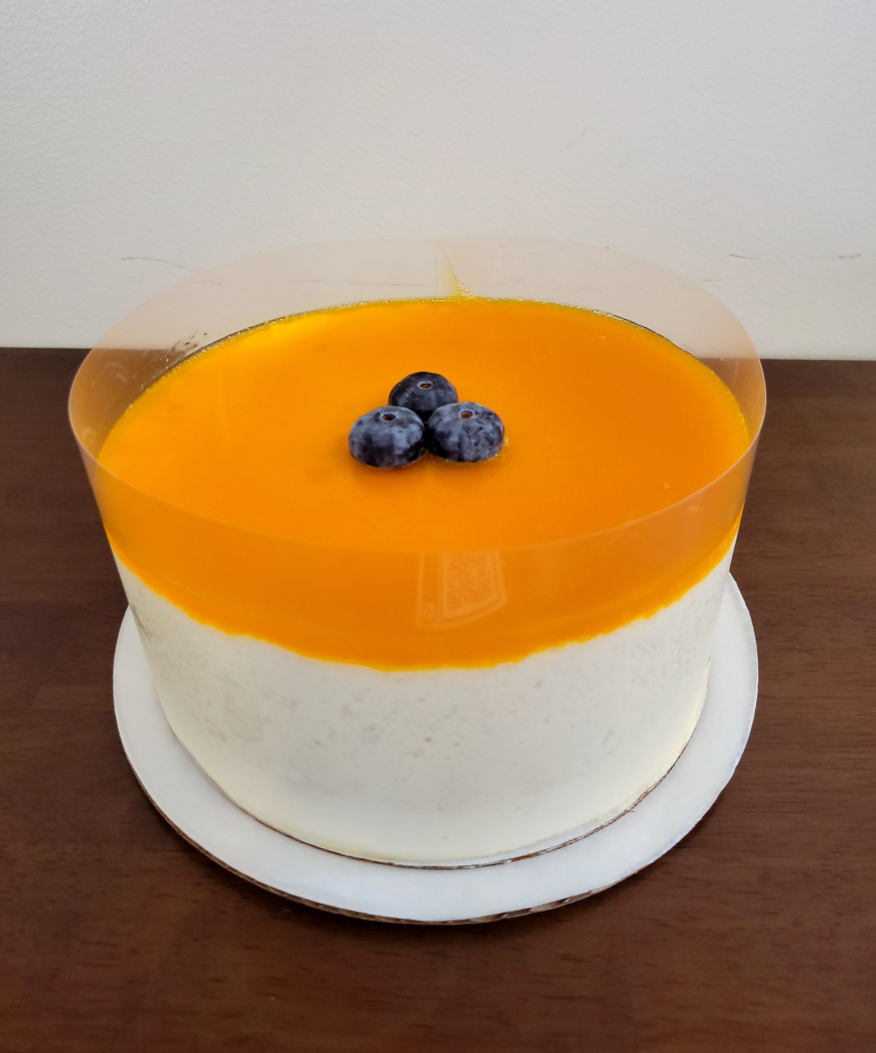 Order Passion Fruit Mousse 7" food online from Ooh La La Bakery Llc store, Silver Spring on bringmethat.com