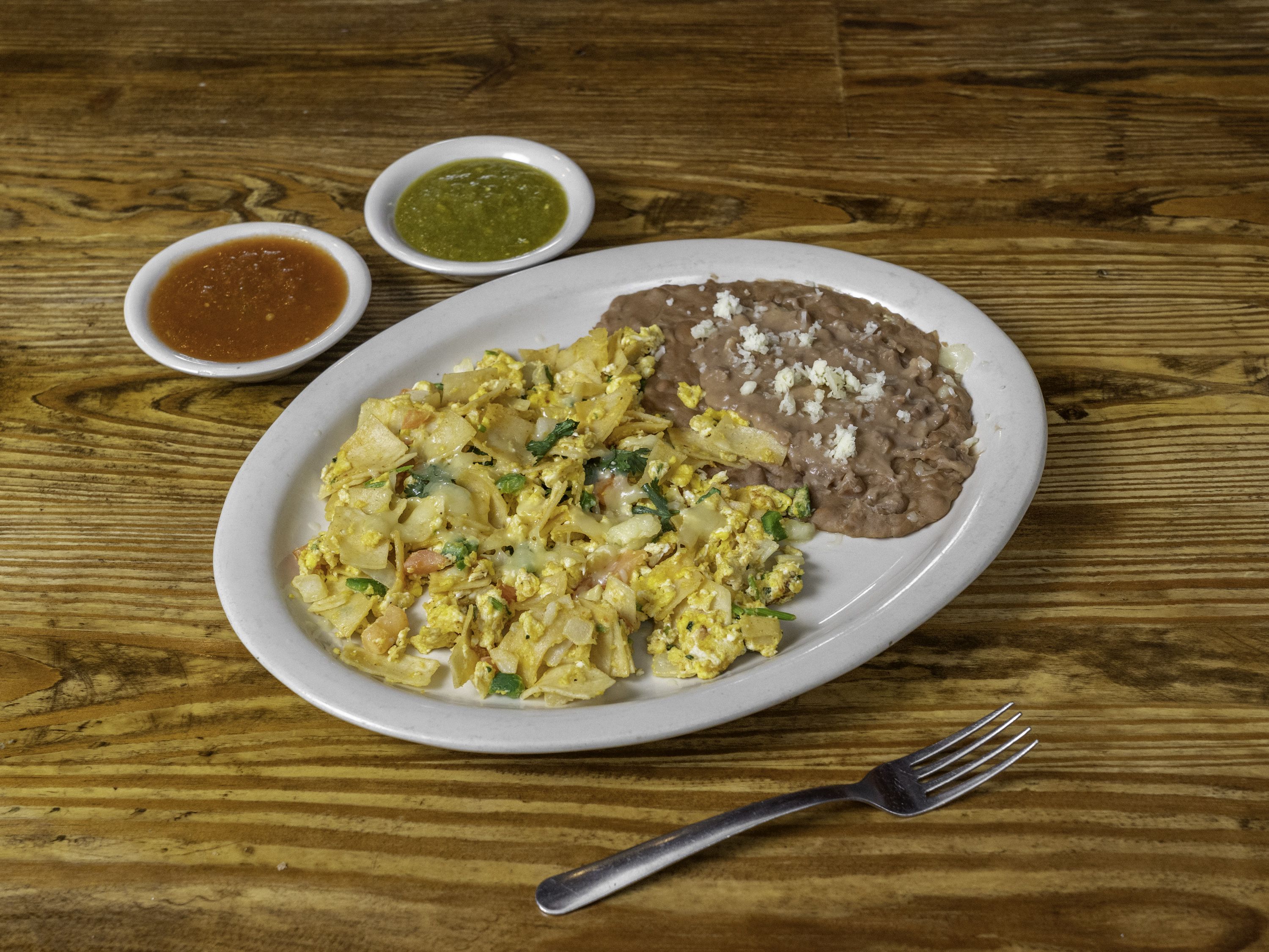 Order Migas food online from Tecate Mexican Restaurant store, Houston on bringmethat.com