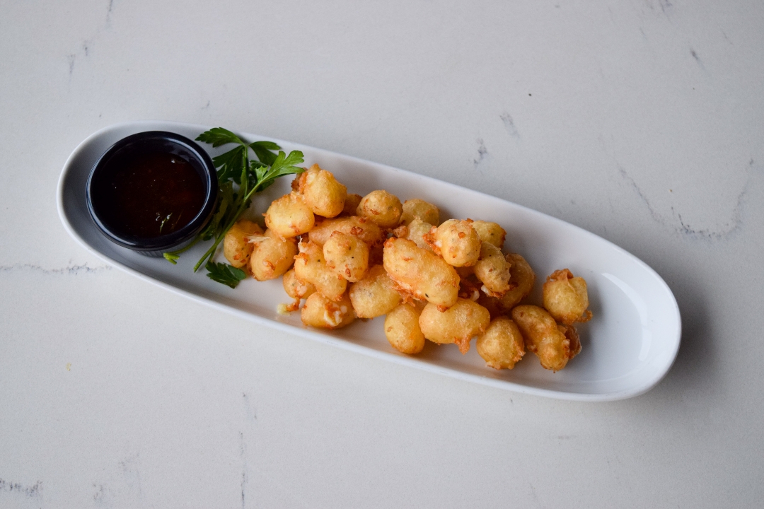 Order Beer Battered Cheese Curds food online from Thirsty Lion Gastropub store, Denver on bringmethat.com