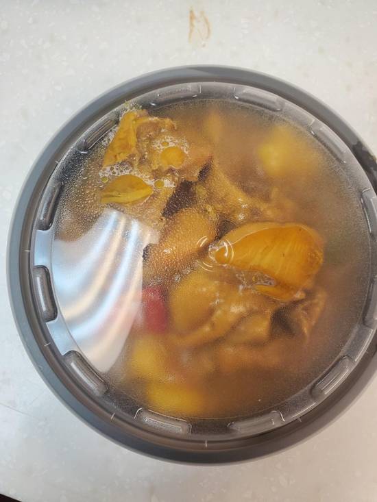 Order Side Order Curry chicken food online from Jamaican Cafe Cuisine store, Newark on bringmethat.com