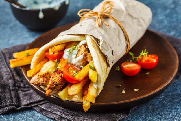 Order Chicken Souvlaki on Pita food online from Sutton cafe store, New York on bringmethat.com