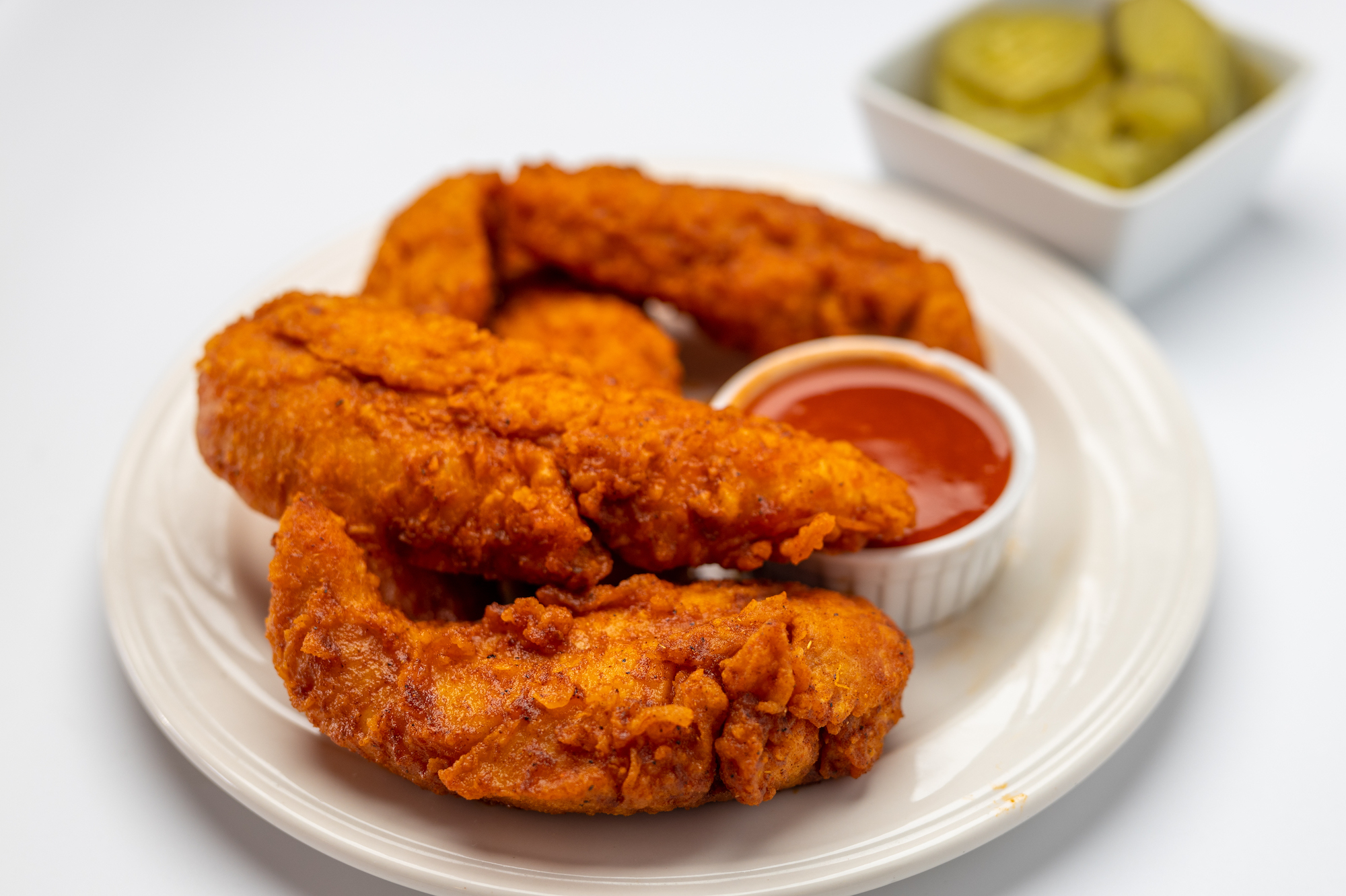 Order 5 Chicken Tenders and 1 Dip (R) food online from Red Nashville Hot Chicken store, Fullerton on bringmethat.com