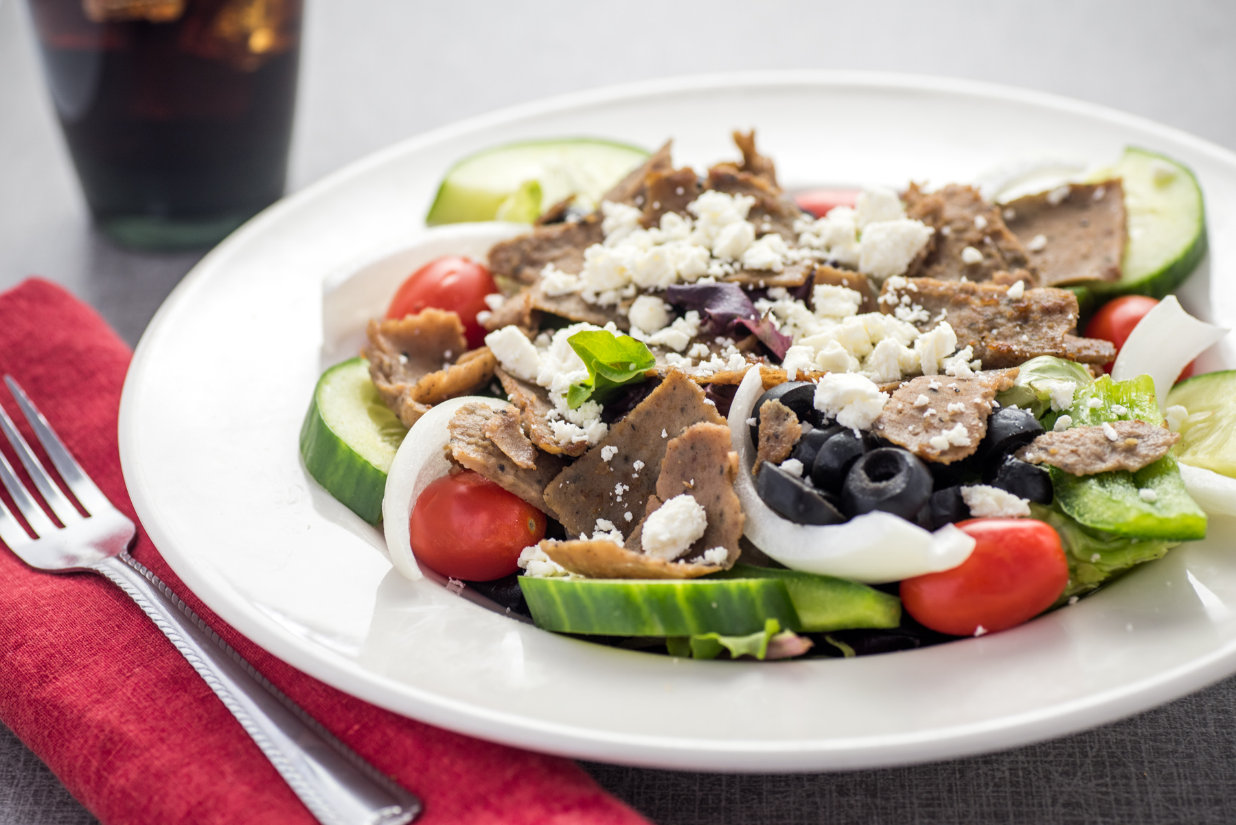 Order Greek Salad food online from Flavors Around The Sqaure store, Painesville on bringmethat.com