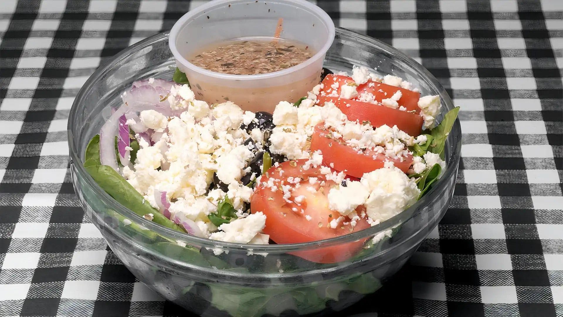 Order Greek Salad - Salad food online from Bucceto's store, Bloomington on bringmethat.com