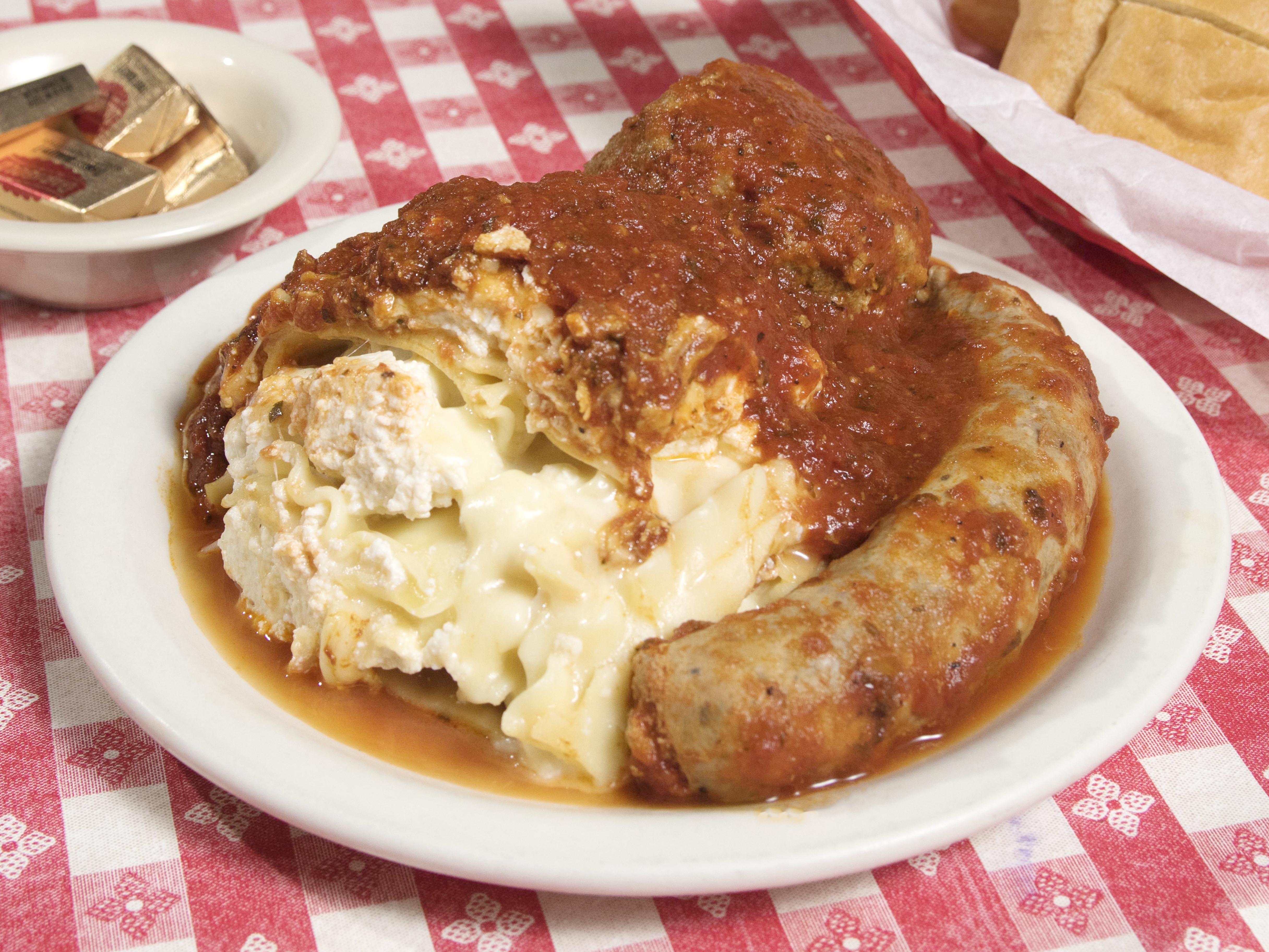Order Lasagna with Sausage and Meatball food online from Filippi Pizza Grotto store, San Diego on bringmethat.com