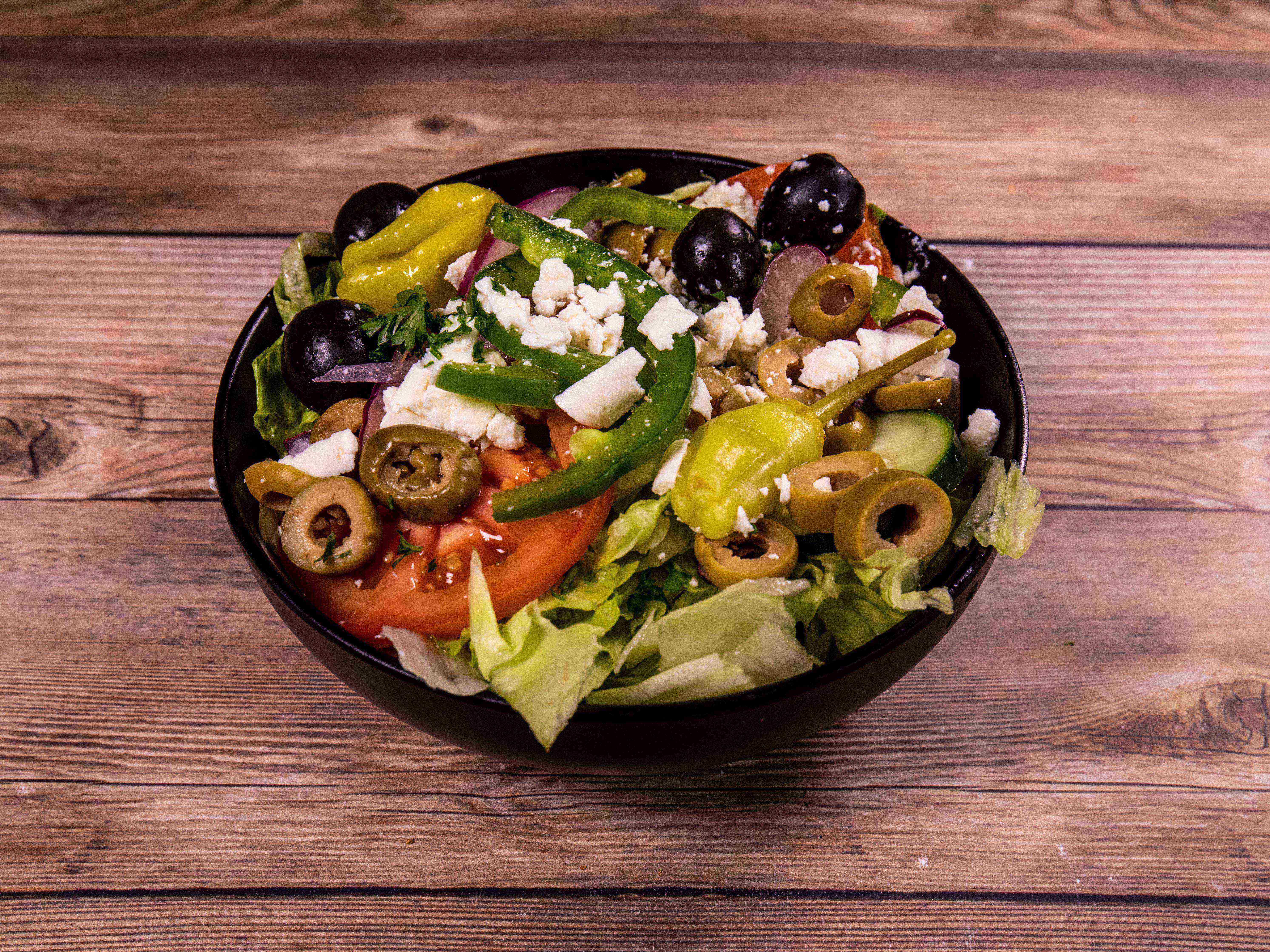 Order Greek Salad food online from Picatta Pizza & Pasta store, Houston on bringmethat.com