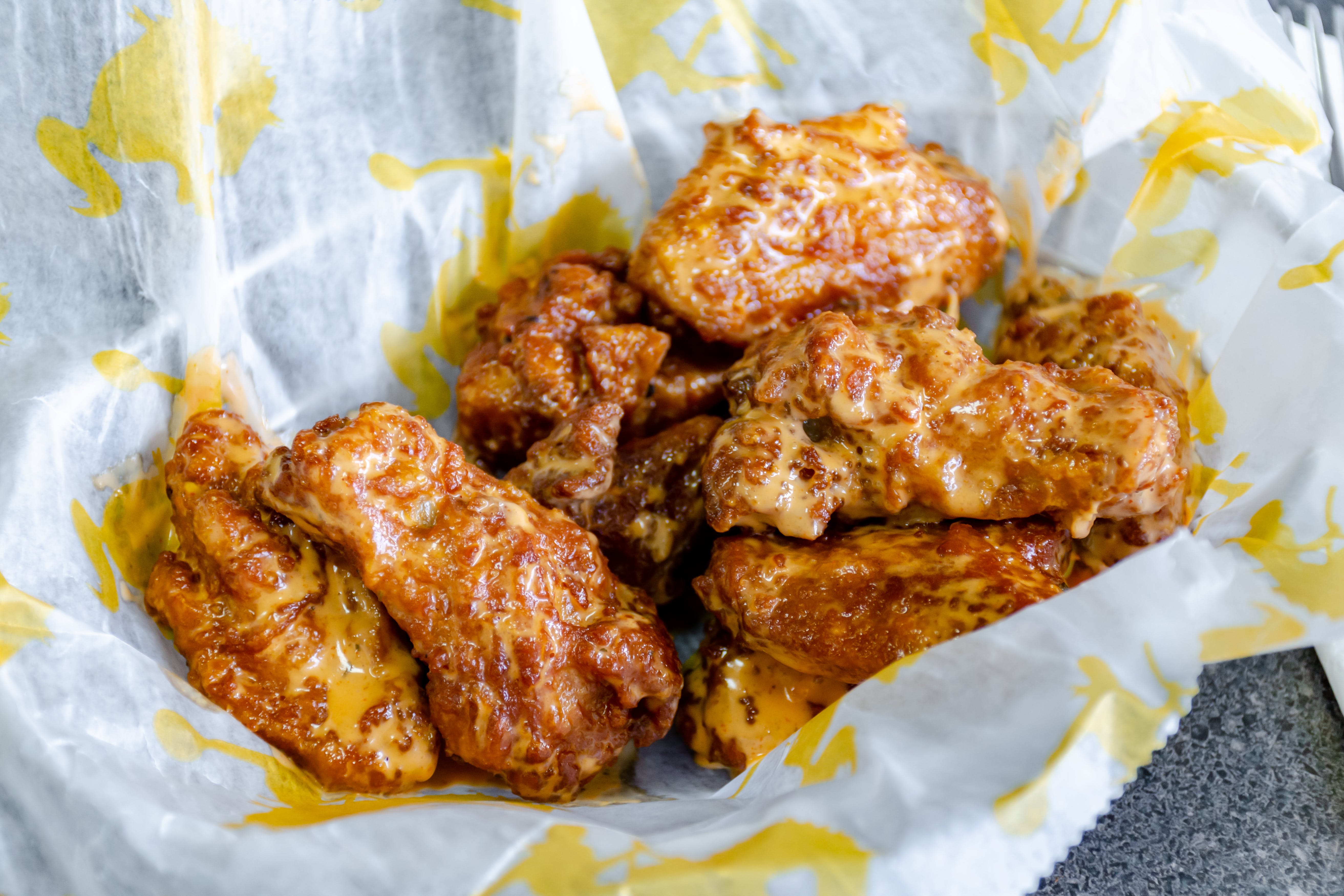 Order Traditional Wings - 10 Pieces food online from Hometown Locker Room Pizza & Sub store, St Marys on bringmethat.com