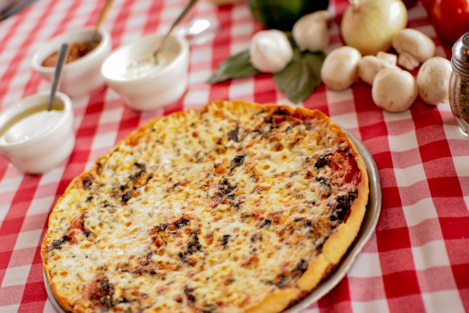 Order Pat Brickhouse Special Thin Crust Pizza food online from Pizano's Pizza store, Chicago on bringmethat.com