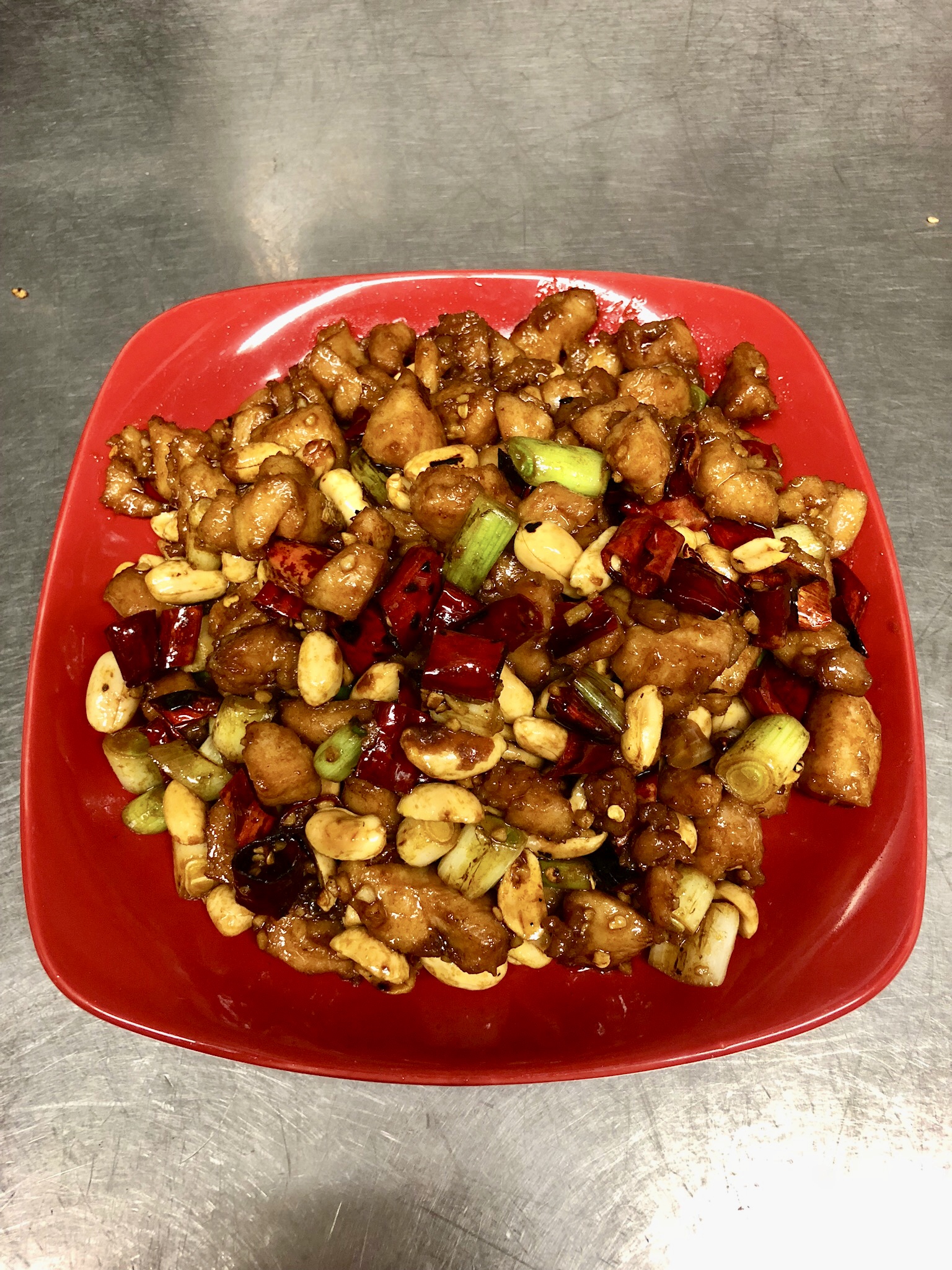 Order 86. Kung Pao Chicken food online from Belly Bombz Kitchen store, Artesia on bringmethat.com