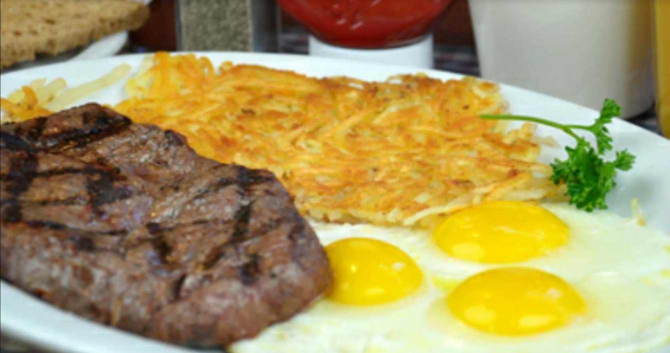 Order Rib Eye Steak and Eggs food online from Kevin's Hamburger Heaven store, Chicago on bringmethat.com