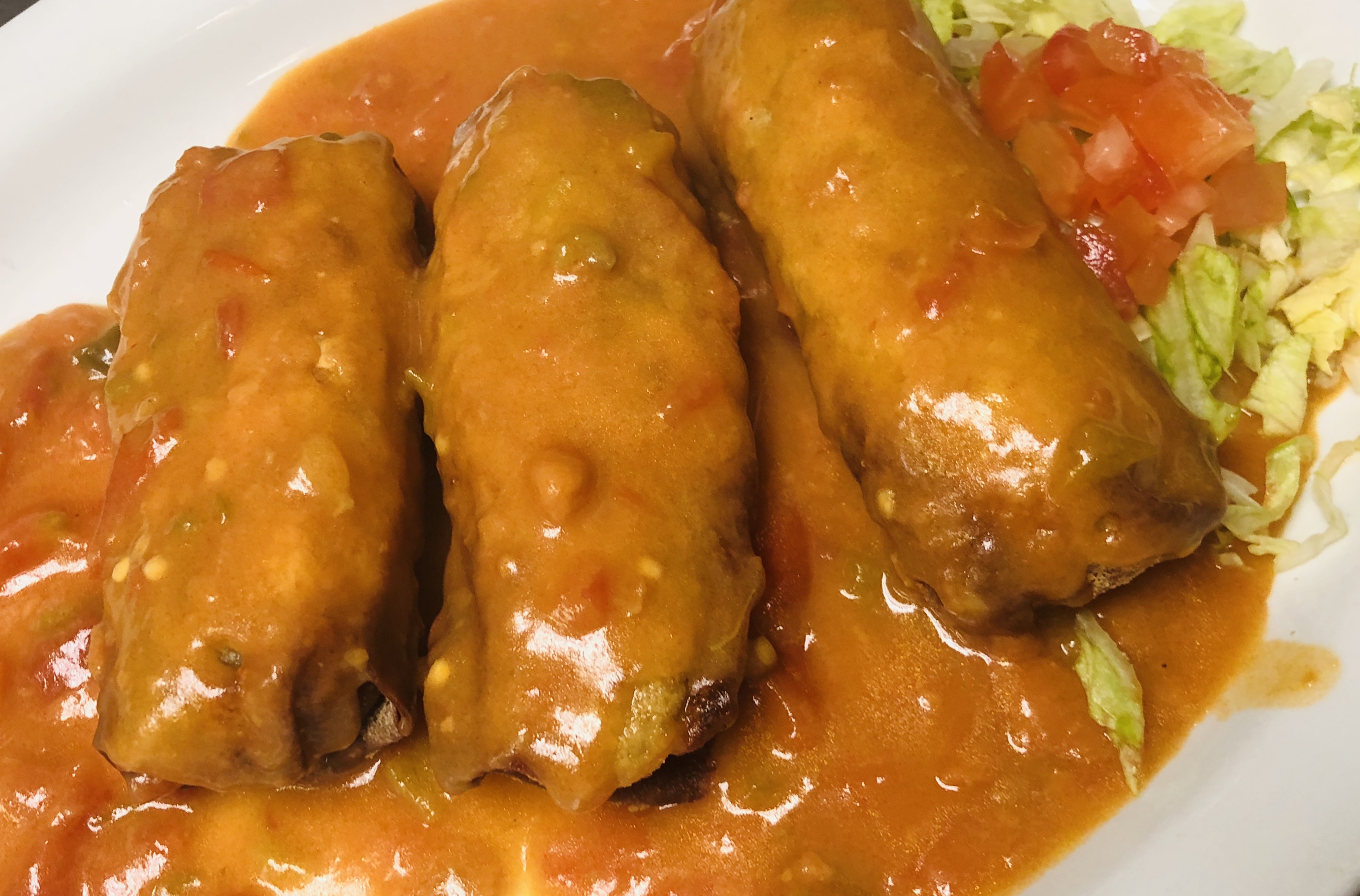 Order 21. Smothered Chile Relleno food online from Los Alcatraces Mexican Restaurant store, Aurora on bringmethat.com