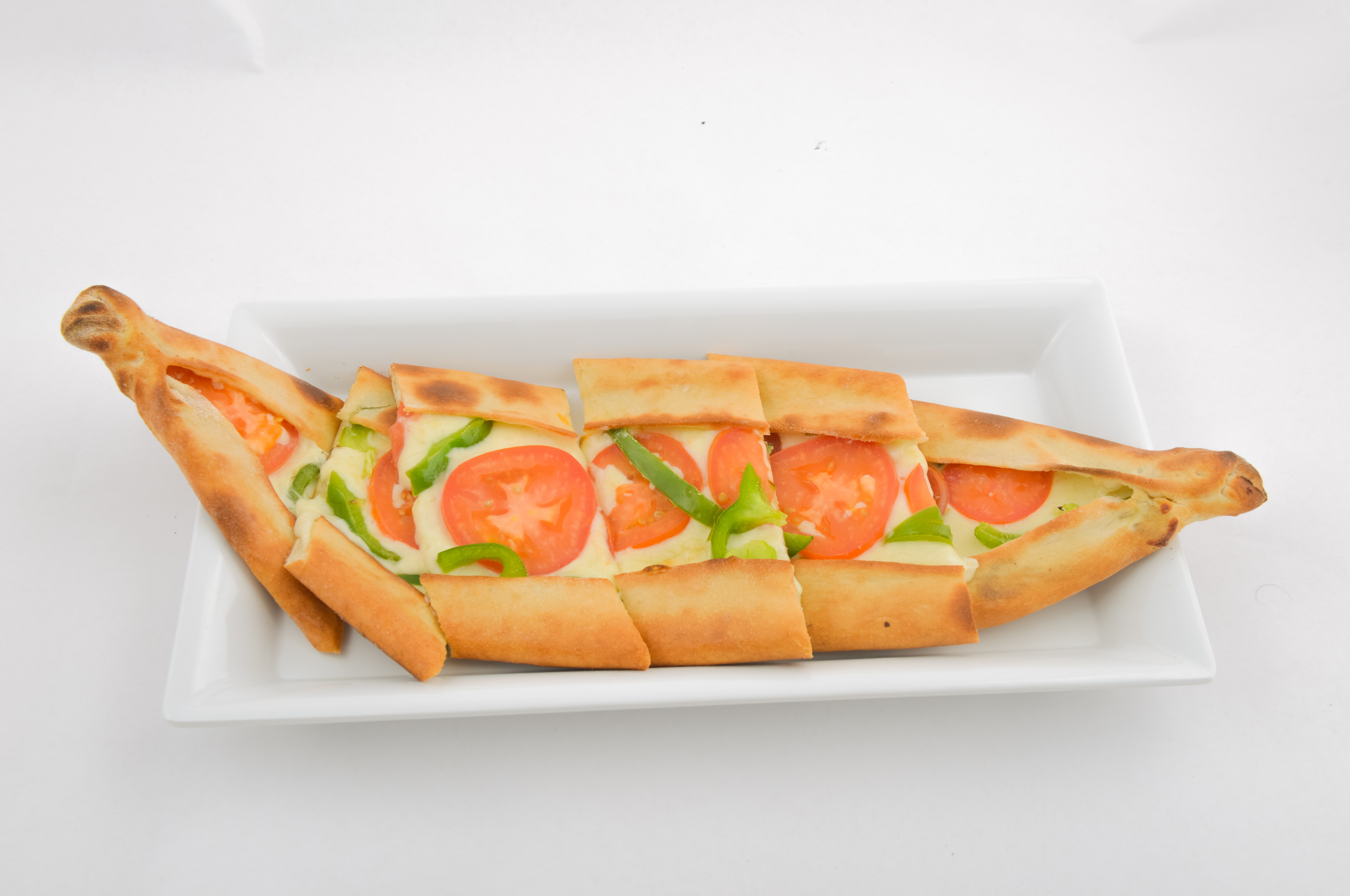 Order Cheese Pide with Tomato Slices and Pepper food online from Mangal Kabob  store, Sunnyside on bringmethat.com