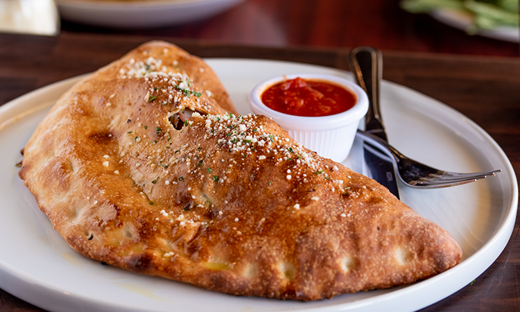 Order New York Calzone food online from Russo's New York Pizzeria - Broadway store, Pearland on bringmethat.com