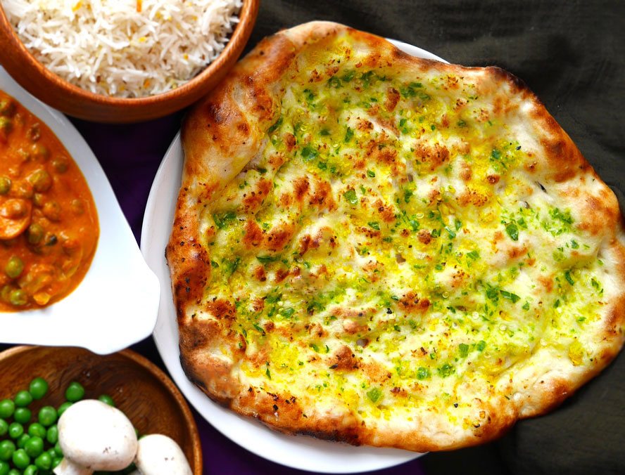 Order 61. Chili Garlic Naan food online from Noori Pakistani & Indian store, San Bruno on bringmethat.com