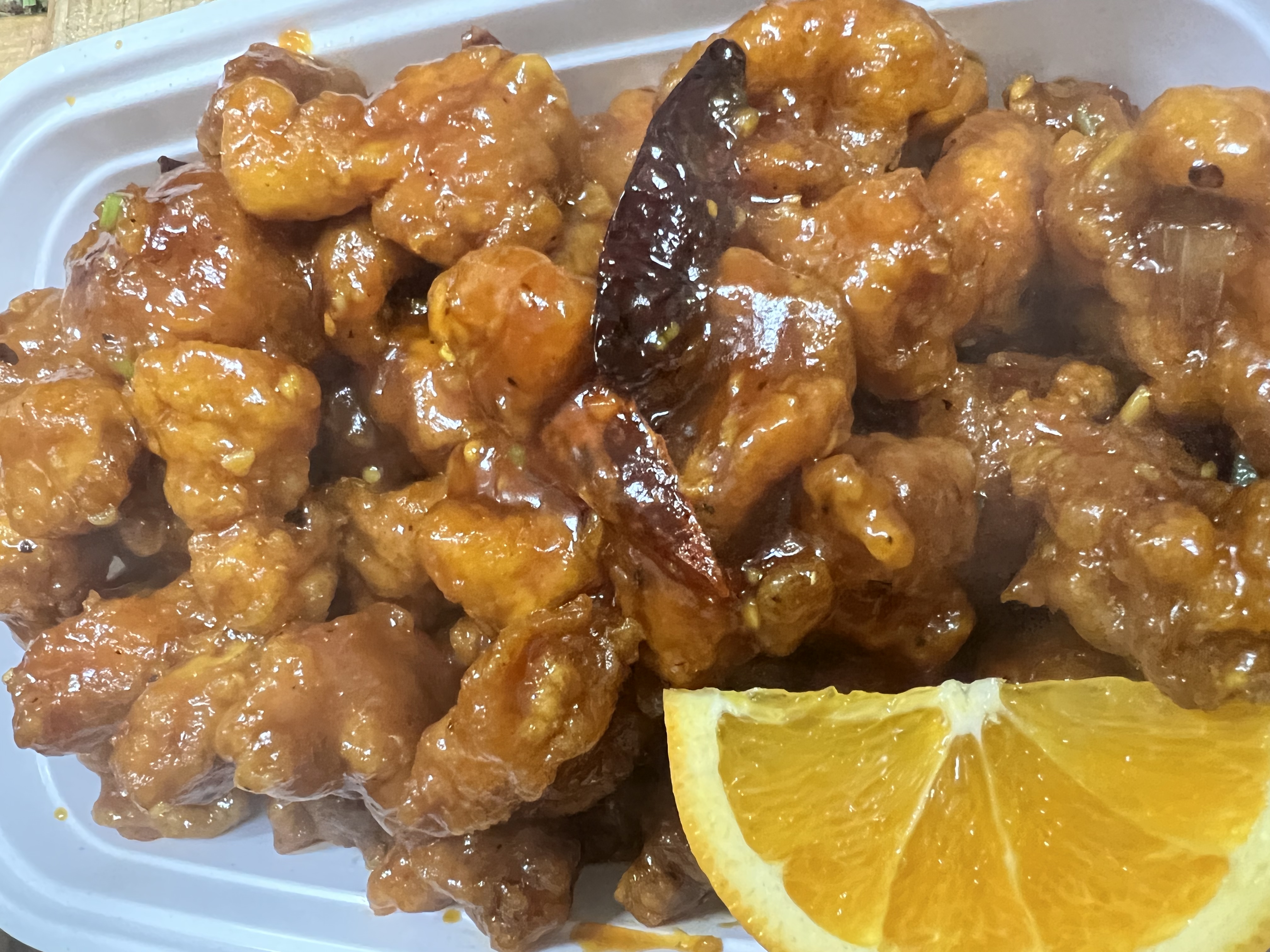 Order 072. Large Orange Chicken food online from Chinn's Chinese Restaurant store, Buffalo Grove on bringmethat.com