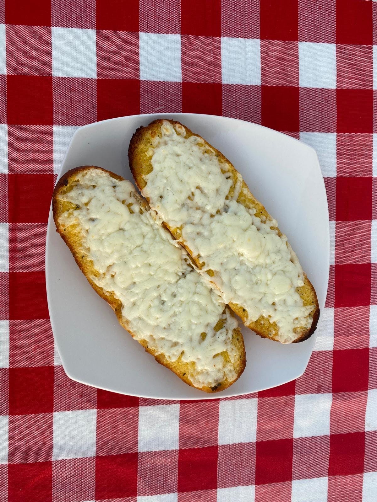 Order Garlic Bread with Cheese - Appetizer food online from Magura Pizza store, Las Vegas on bringmethat.com